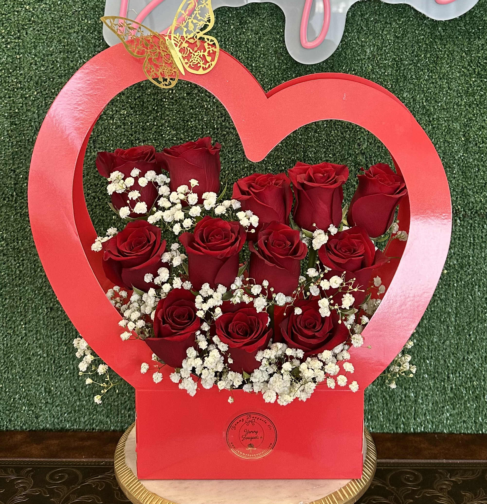 Heart roses Heart roses - Dozen roses in a heart shape box "Picture is a reference every arrangement would not be exactly the same. Color Substitution may apply. Flowers and color substitution may apply"