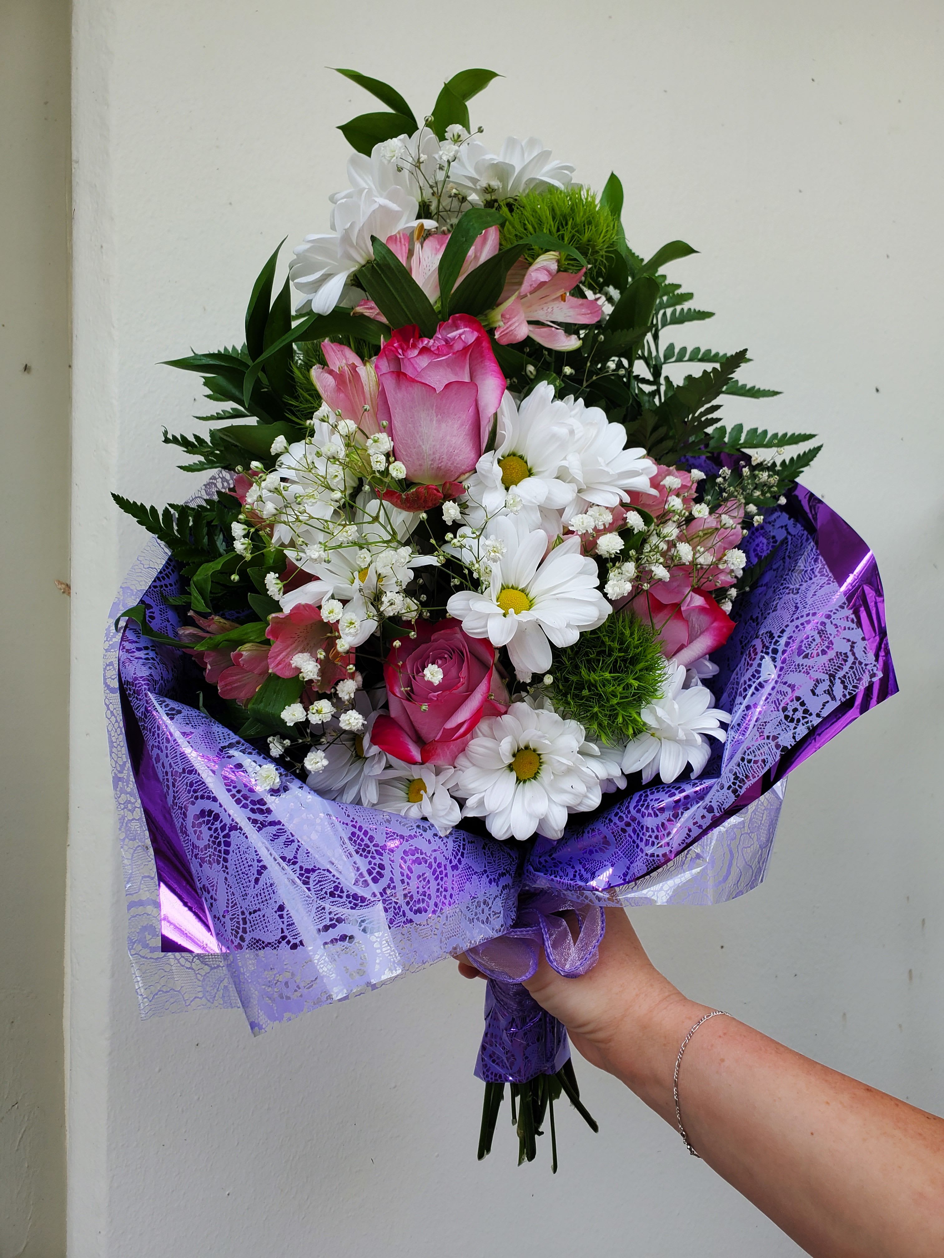 Presentation bouquet - Roses, daisies, alstroemeria, with greenery and babies breath wrapped in paper with ribbon