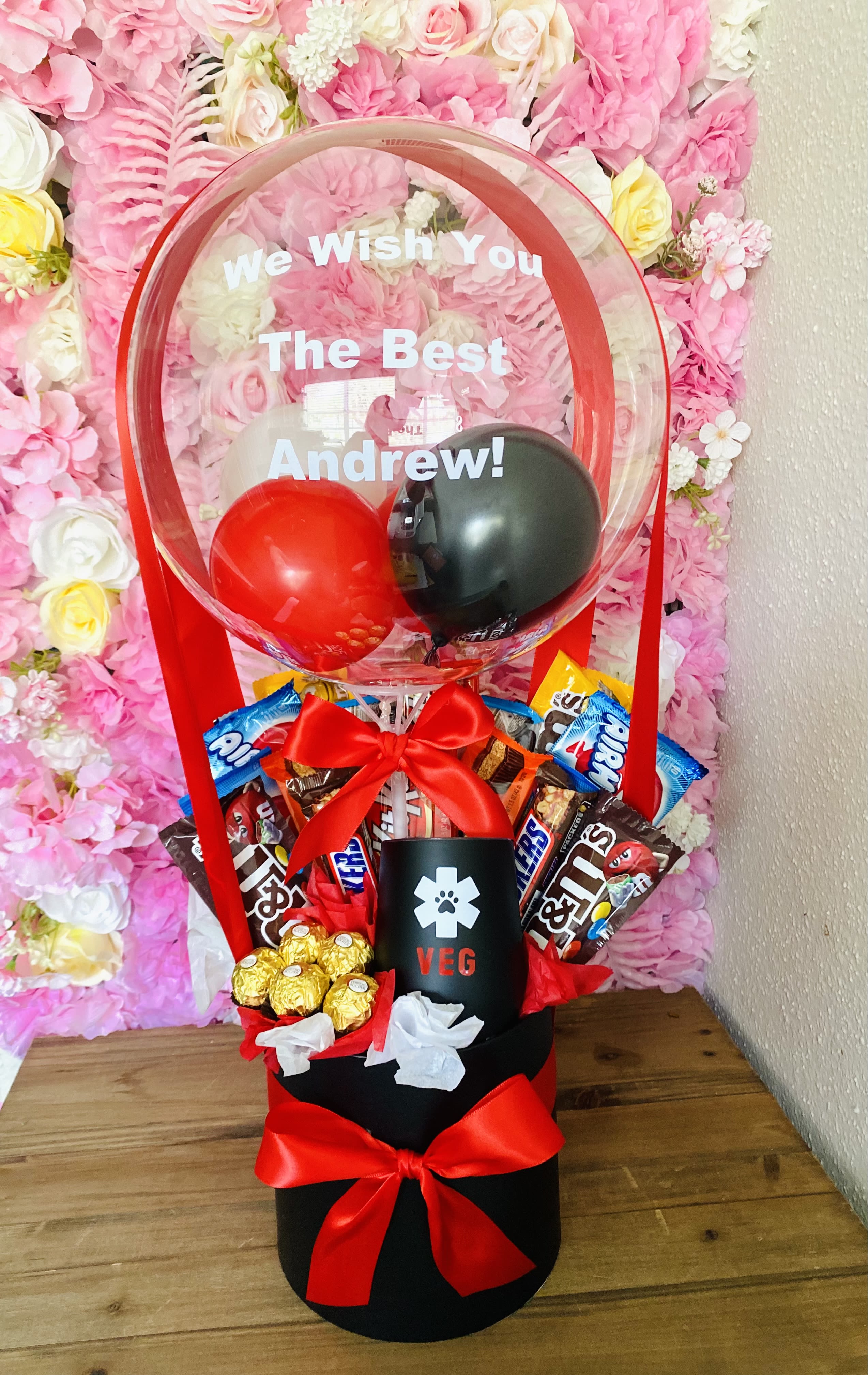 Candy Lovers Balloon Arrangement - Mix of chocolate &amp; candy, with a personalized wine cup &amp; custom balloon. Colors of ribbon can be changed, just request it on notes at checkout. 