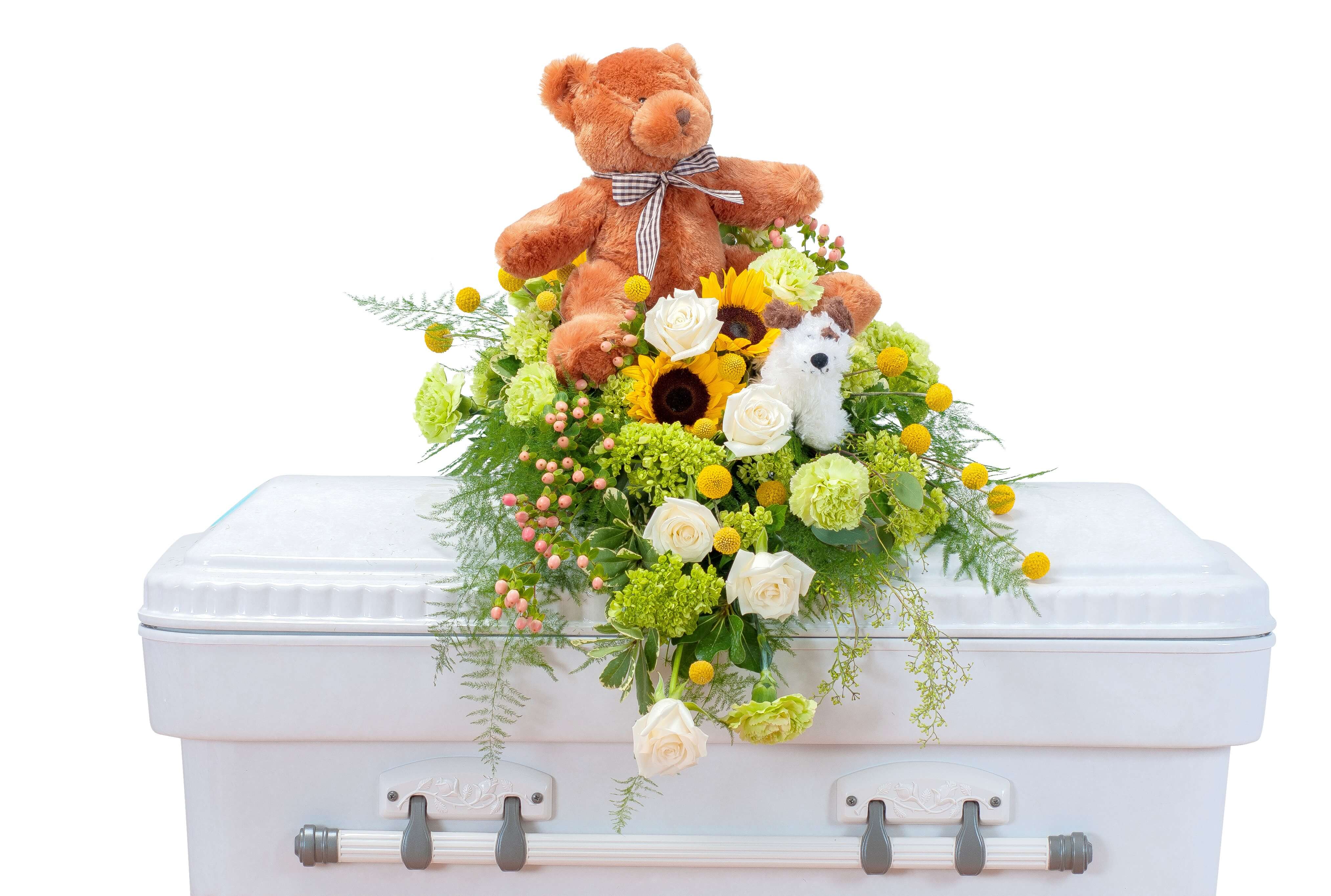 Tiny Angels Casket Spray Tiny Angels Casket Spray - This sweet combination of flowers and plush is perfect for a tiny angel.