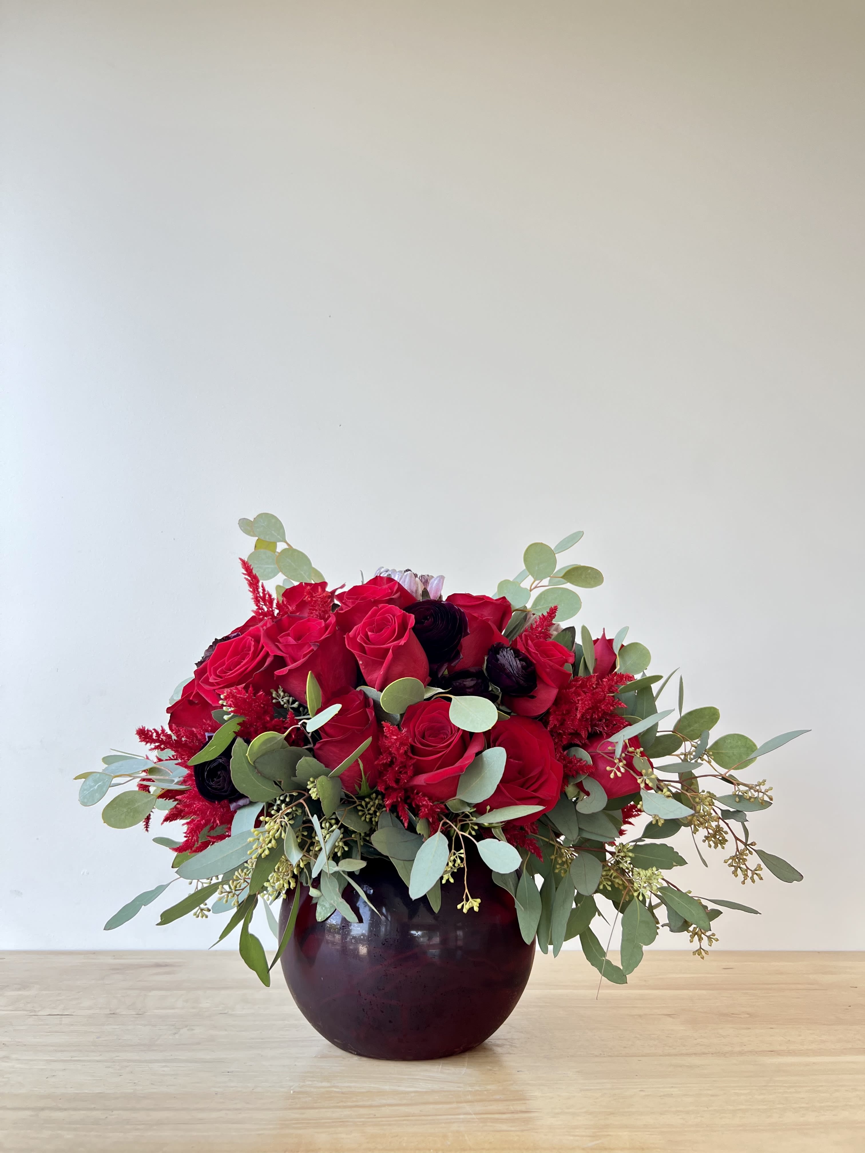 Mon Amour Mon Amour - Beautiful round flower arrangement contains 2 dzn red roses, green dyanthus, eucalyptus mix, and more.