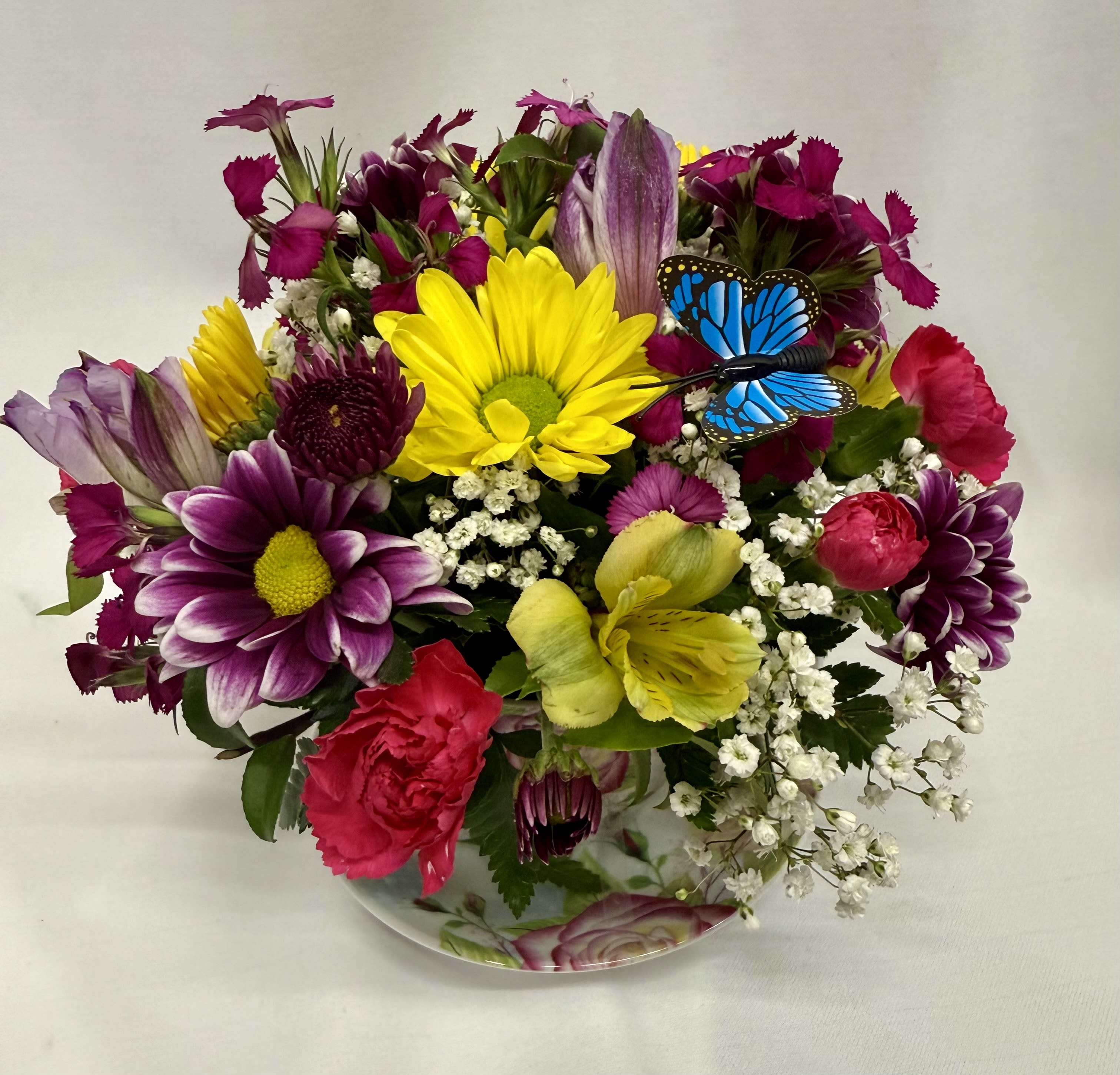 Tea party! - Surprise her with a Keepsake floral tea cup and saucer filled with colorful blooms! styles vary