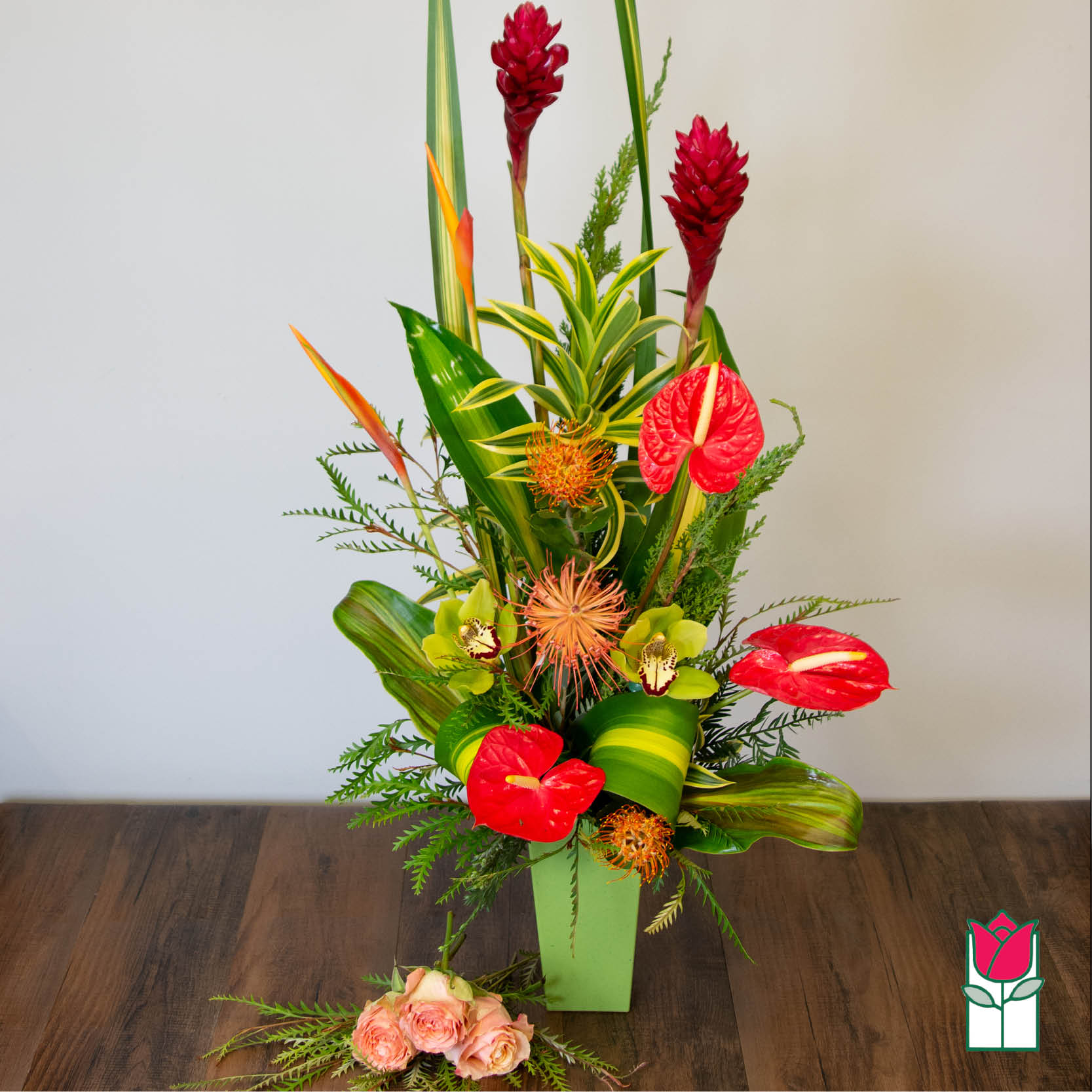 Beretania's Dole Tropical Arrangement (Seasonal Varieties Vary) - The Beretania Florist Dole Tropical Arrangement is tall and showy. The Dole is designed as a slender centerpiece for narrow spaces.  Approx. 30 
