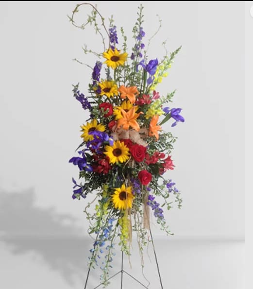 Wildflower Spray - CHS1068 Wildflower Spray - CHS1068 - Send the look of wildflowers in this beautifully designed standing spray. Substitutions of equal or greater value may be made depending on season and availability of product or container. Shown in deluxe CHS1068
