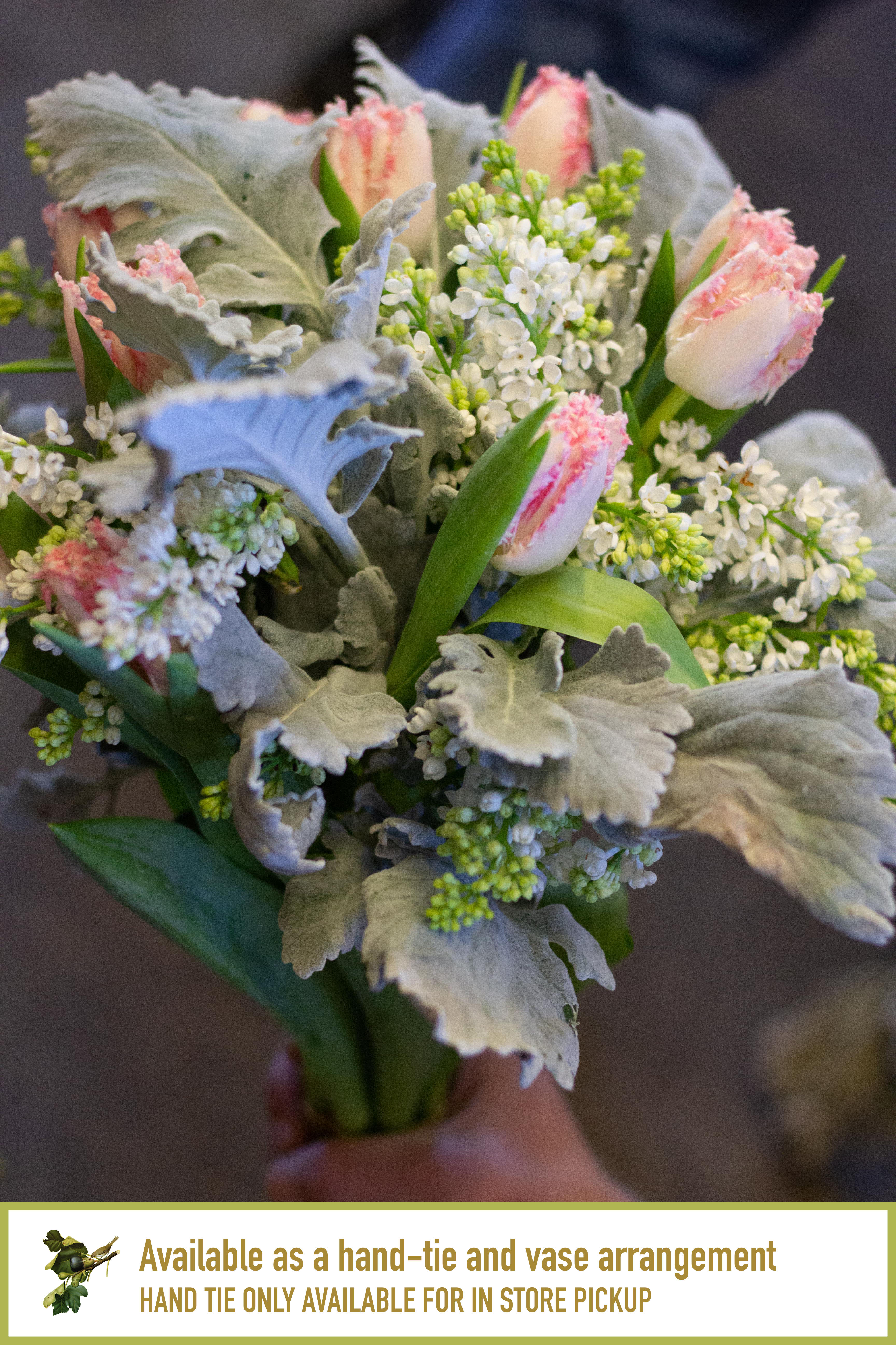 Springtime Fields - This arrangement is reminiscent of lush green fields during springtime after a heavy rain, when the sun shines on all the new growth. It's a charming arrangement for your darling on valentines day, or really for any reason as it is quite cheerful and can brighten any room.