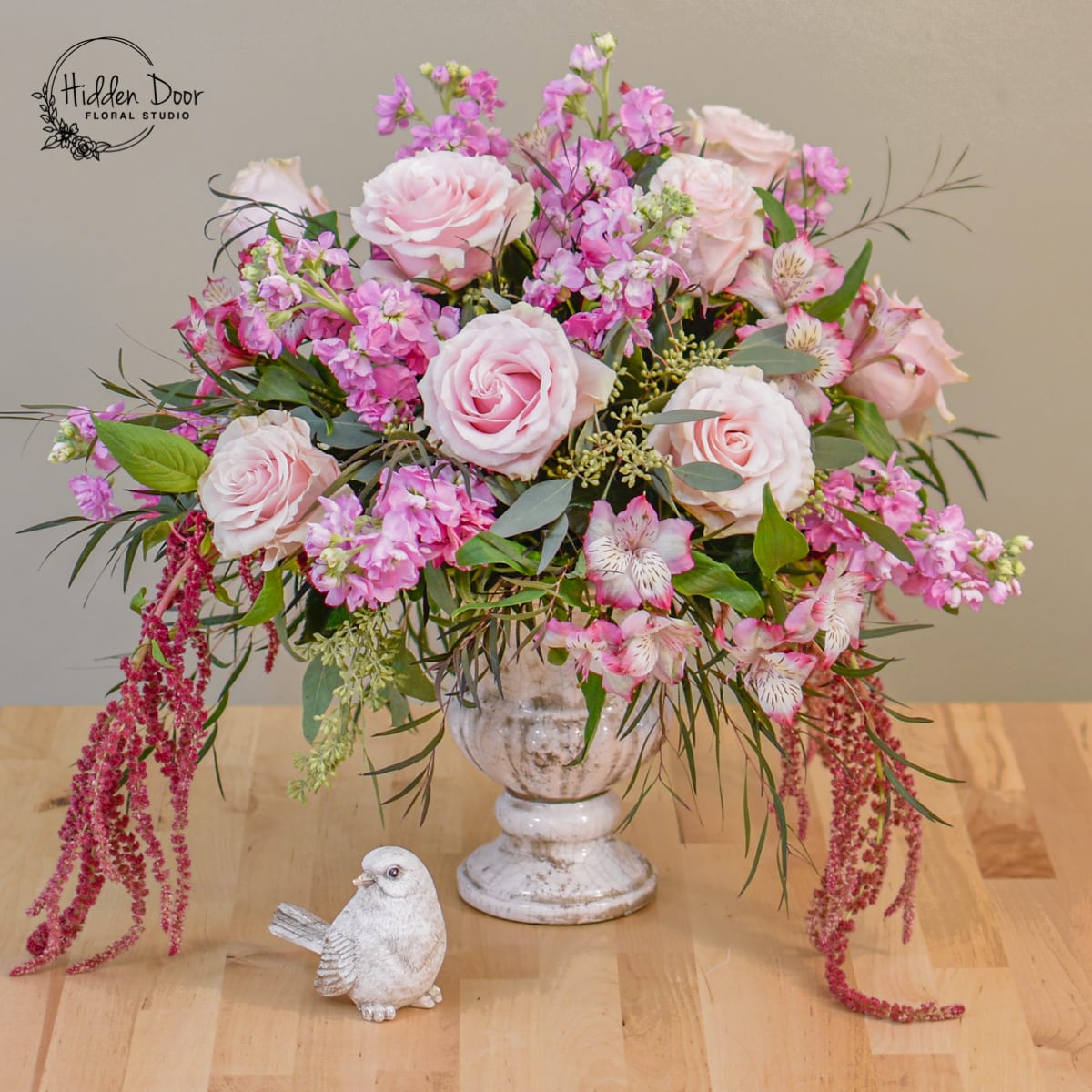 Venetian Venetian - Vase will be replaced with a Chealsea Vase, an antiqued elegant glass. Classic and elegant floral design made of roses, stock and other seasonal flowers.