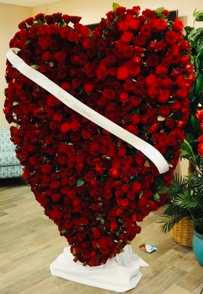 This Heart of Mine - A very loving way to celebrate your loved one. A huge heart   chock full of red roses for your loved one. Create a custom banner to get your message across. 