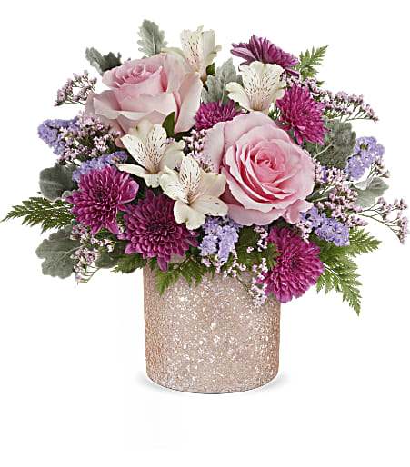 Blooming Brilliant Bouquet - Add a touch of sparkle to this special day! Showcasing a crushed glass textured ballerina pink hue cylinder, this girlie bouquet has a brilliant display of pink blooming flowers. Approximately 14 inches wide and 12 1/2 inches tall for the Standard size.