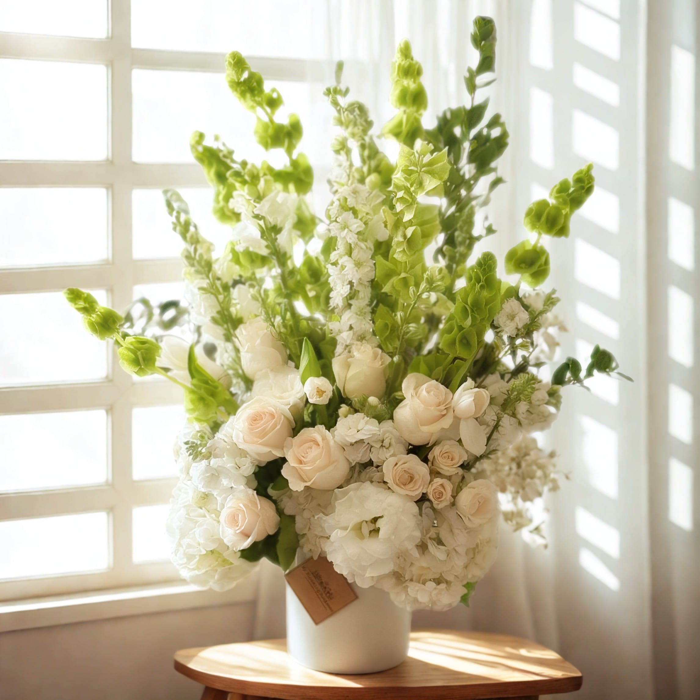 Sweet Comfort Arrangement – A Peaceful Touch of Elegance - Sweet Comfort Arrangement – A Peaceful Touch of Elegance The Sweet Comfort Arrangement by My Blooming Business is a serene and graceful floral design featuring a soothing blend of premium white flowers and fresh greenery. Delicate and refined, this arrangement evokes peace, comfort, and timeless beauty—making it perfect for sympathy, get-well wishes, or simply brightening a space with elegance.  Expertly crafted by our floral designers, each bouquet showcases seasonal white blooms paired with lush foliage for a soft and sophisticated look.  My Blooming Business is a top-rated florist in Los Angeles, recognized on Google, Yelp, and BloomNation, proudly offering same-day flower delivery throughout the Greater Los Angeles Area, including the San Fernando Valley and San Gabriel Valley.