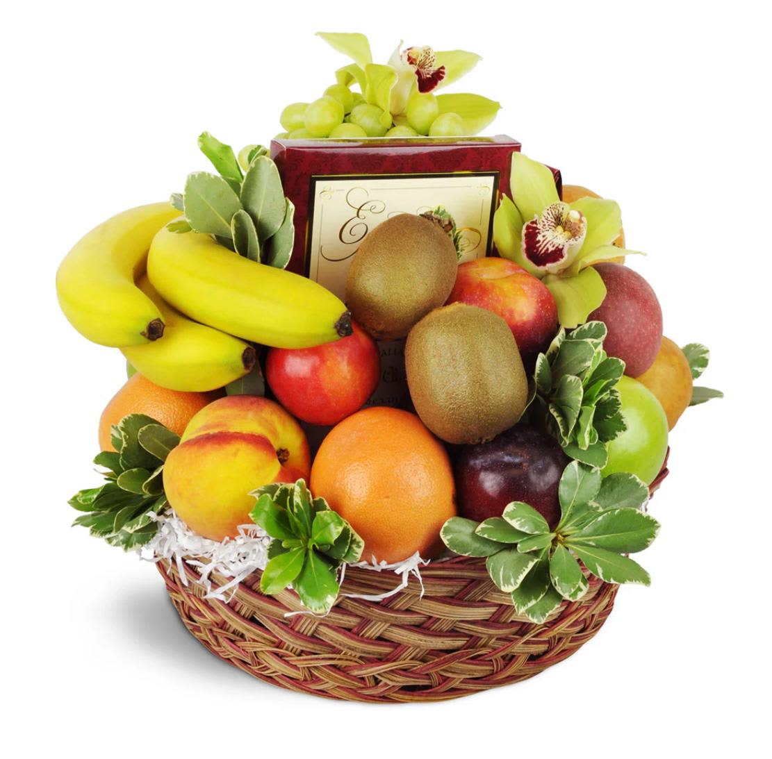 Fruit And Treats Basket - Fruit and Treats combines fresh seasonal fruit, decadent chocolates, and the timeless elegance of orchids to create a thoughtful gift perfect for any occasion. Each item is carefully selected and arranged to offer a delightful balance of flavors and beauty, ensuring an experience that’s both refreshing and indulgent.  Ideal for celebrations, thank-yous, or simply to bring joy to someone special, this curated selection provides a delightful combination of treats that’s sure to impress.