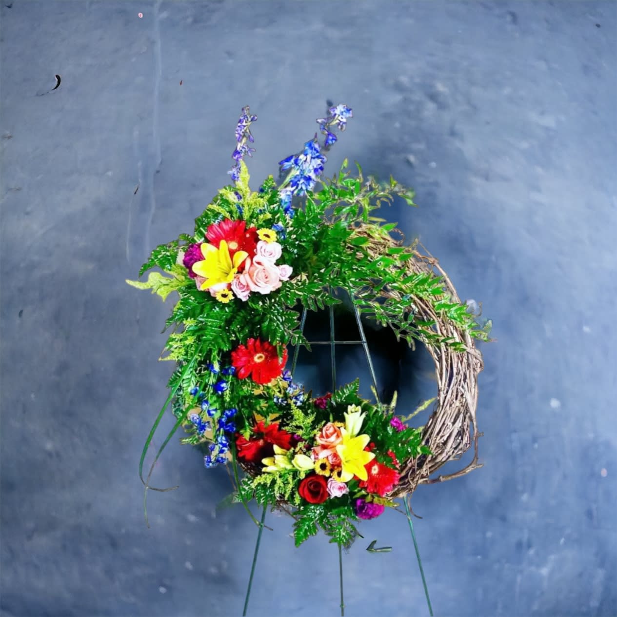 Brilliant Sympathy Wreath - Pay your last respects to a departed friend or loved one's family with a uplifting floral standing spray. The natural beauty of each flower offers comfort to all in attendance. Let Anointed Flowers &amp; Gifts help you choose the right standing funeral spray for your final tribute. 