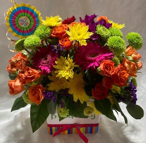 Birthday bouquet and pick - Birthday celebrations are bright and cheerful.  Just like this bouquet of spray roses, gerberas, mums, alstroemeria, and others as available in brilliant colors.  The vase and pick also announce the birthday celebration. 