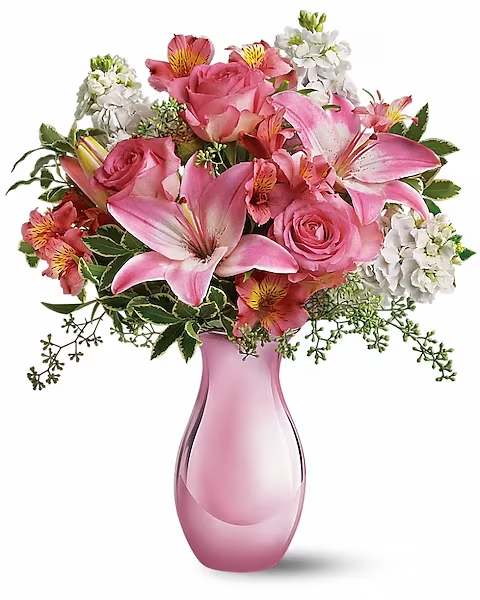 Teleflora's Pink Reflections Bouquet with Roses - Oh, so pretty in pink, this beautiful bouquet will make their day. With so many pretty flowers in such a uniquely beautiful vase, this can't-miss gift is perfect for Mother's Day, a birthday, any day!  Pink roses and asiatic lilies, dark pink alstroemeria, white stock and seeded eucalyptus are splendidly arranged in an exclusive Pink Reflections vase. Sending this charmer will be a great reflection on you!