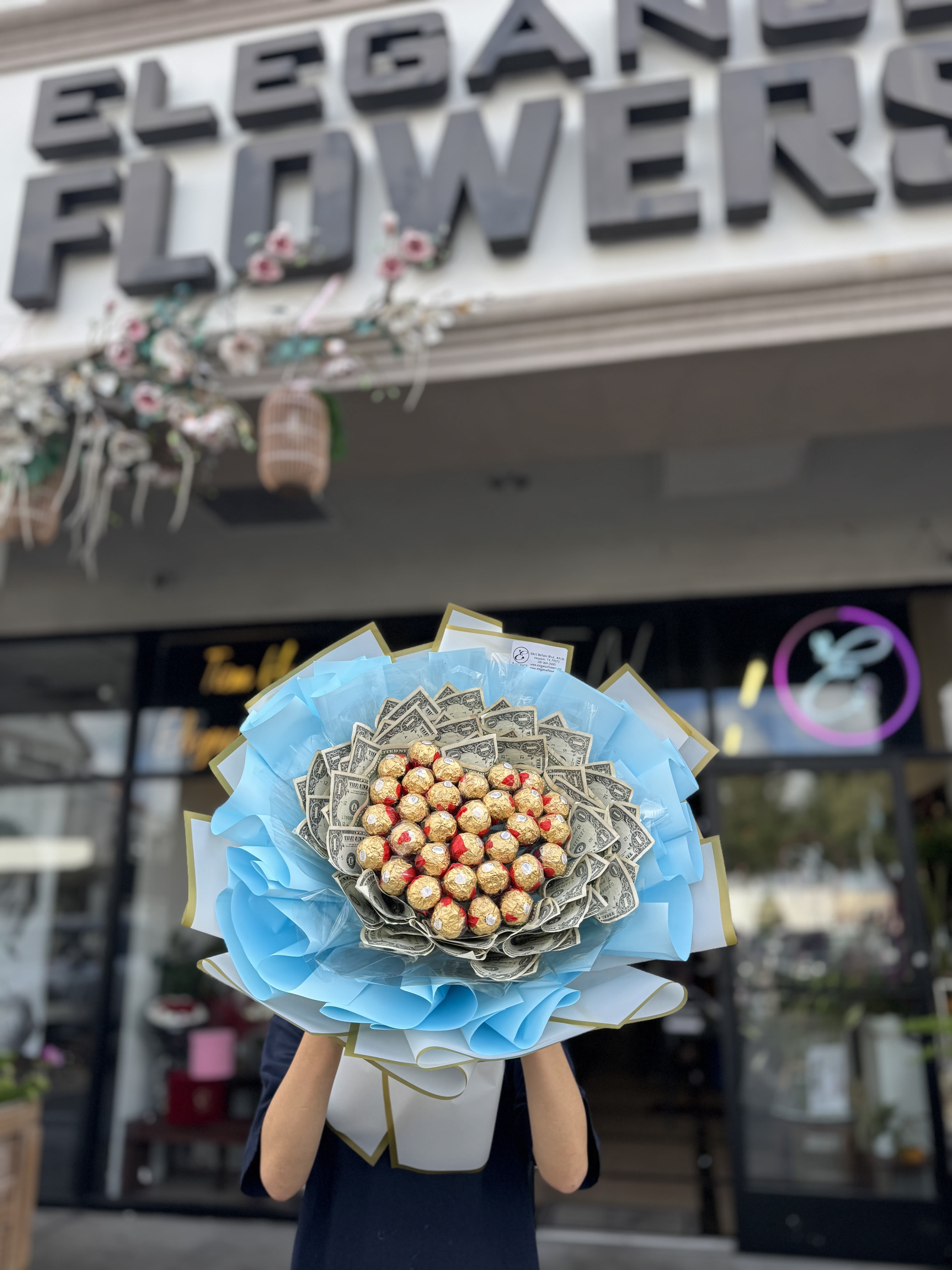 Money Bouquet #2 - Includes $1x30 ($30), call for more information at 281-564-2600. Money bouquets are unique arrangements featuring dollar bills. They make a creative and luxurious gift for special occasions like birthdays, anniversary, or graduations, combining elegance with practicality.