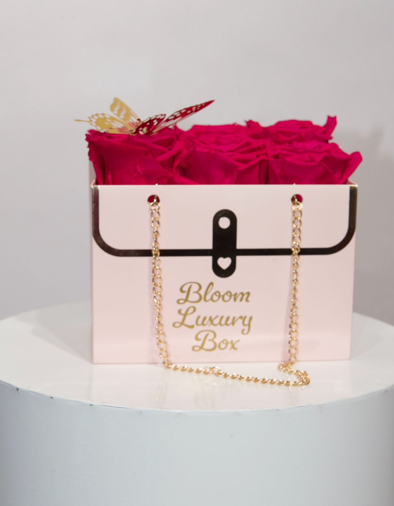 hot pink roses in pink purse - hot pink natural roses in pink purse