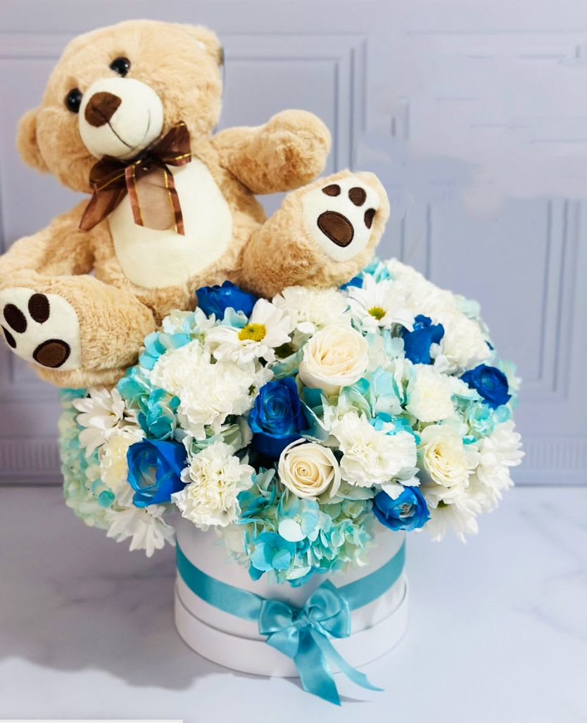 Welcome Baby Boy Box  - Beautiful Box with Blue Roses and White Roses, Carnations, Hydrangeas and White Daisies, INCLUDES: MEDIUM TEDDY BEAR. Bouquet will be delivered approximately as pictured.