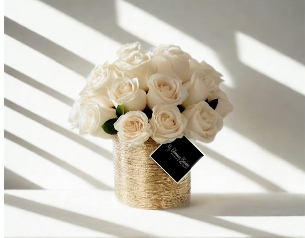 Cream de la Cream Arrangement – Luxury in Every Petal - Cream de la Cream Arrangement – Luxury in Every Petal Elevate any moment with the timeless elegance of the Cream de la Cream Arrangement by My Blooming Business. Showcasing premium Vandela cream roses in a sleek golden cylinder vase, this arrangement is the perfect expression of understated luxury and sophistication.  Whether you’re celebrating a milestone, expressing sympathy, or sending a heartfelt gift, the Cream de la Cream adds a soft, refined touch to any occasion.  Proudly top-rated on BloomNation, Google, and Yelp, My Blooming Business offers same-day flower delivery throughout Los Angeles, including the San Fernando Valley and San Gabriel Valley.