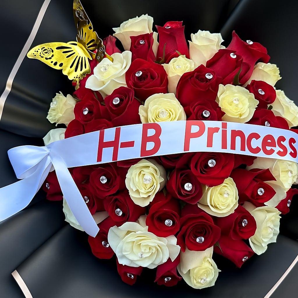 Happy Bday buchon Happy Bday buchon - Red roses and white roses. Includes crystal pins, butterfly, banner Flower and color substitution might apply