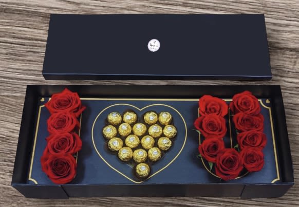 I LOVE U Rose Box (limited quantities) - This elegant gift set will make any occasion extra special. Featuring one dozen beautiful, fresh roses paired with indulgent Ferrero Rocher chocolates, it’s the perfect way to show your love and appreciation.  Whether it’s a romantic gesture or a heartfelt surprise, this timeless combination will leave a lasting impression. Add a personalized gift message to make it even more meaningful!