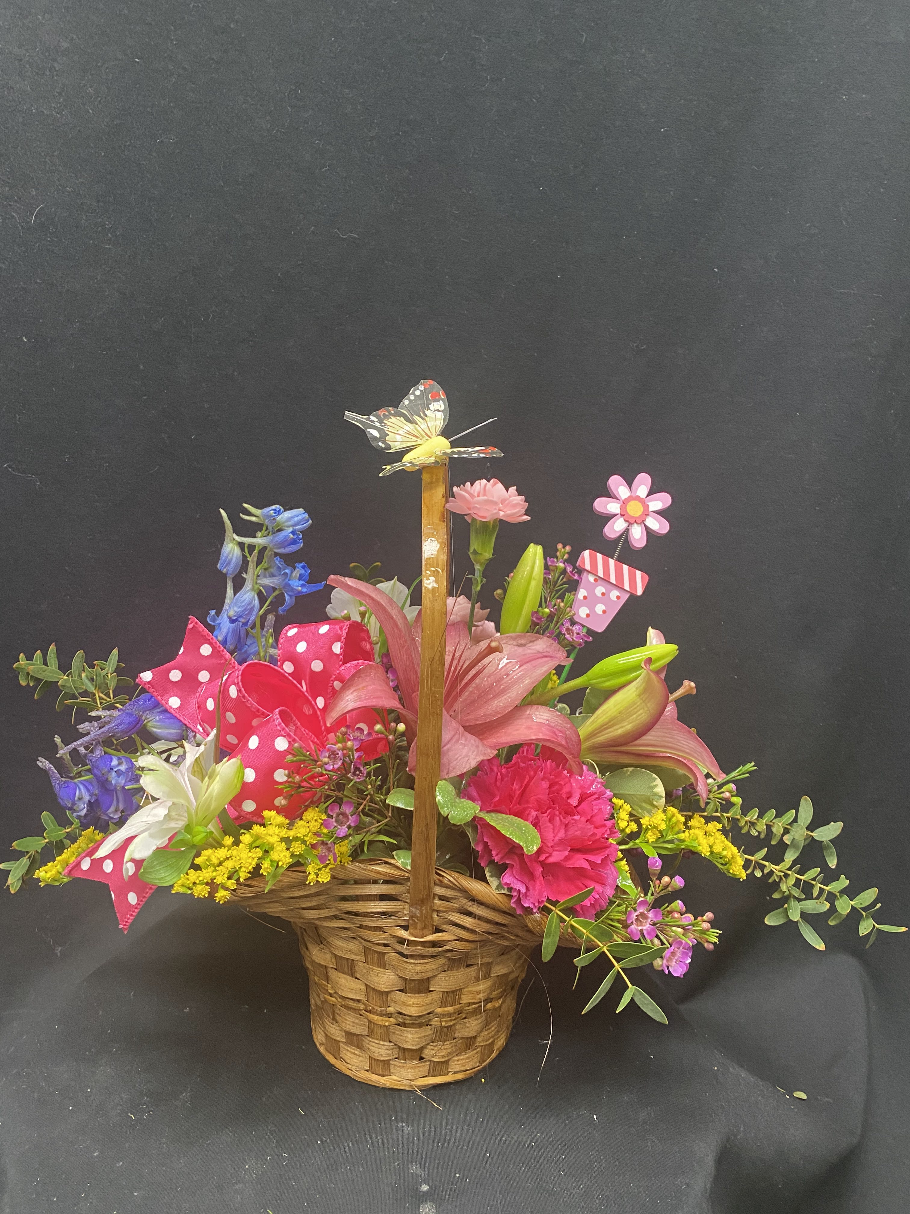 Looking at you - Basket full of lillies, carnations, delphinium, alstromeria, and a butterfly