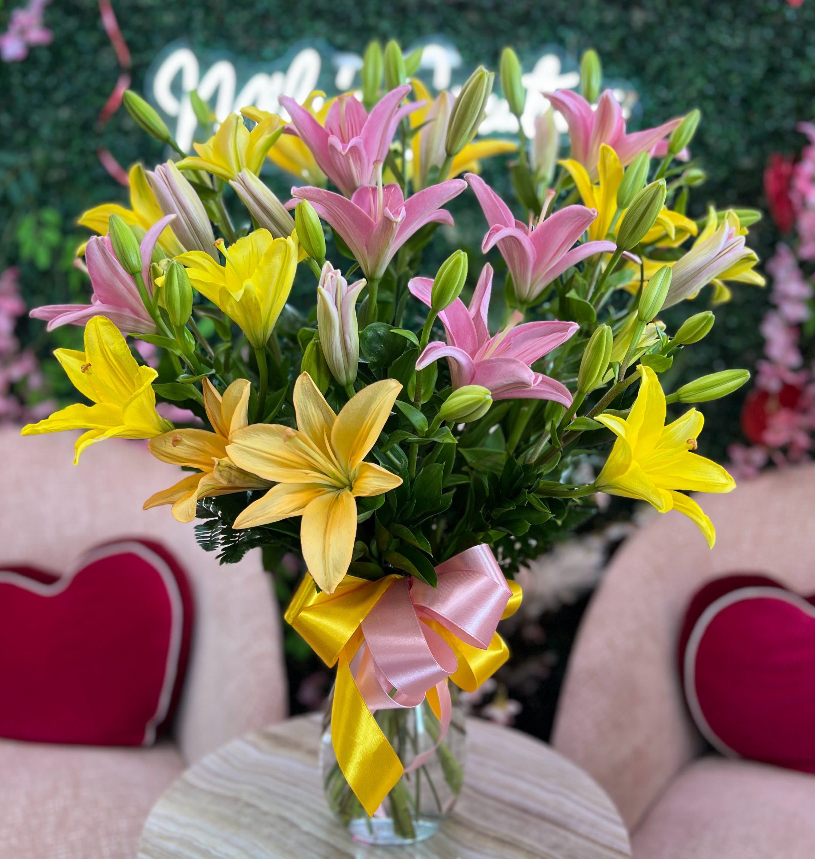 Colorful Lily Bouquet  - Lily bouquet is an elegant and timeless floral arrangement that showcases the beauty and grace of these iconic blooms. The bouquet  include a mix of colors. The lilies’ petals often have delicate speckles or subtle color gradients, contributing to their intricate beauty. The bouquet is complemented with lush green leaves or sprigs of other greenery for a balanced look. Fragrant and sophisticated, a lily bouquet is perfect for celebrations, romantic gestures, or simply bringing a touch of nature.