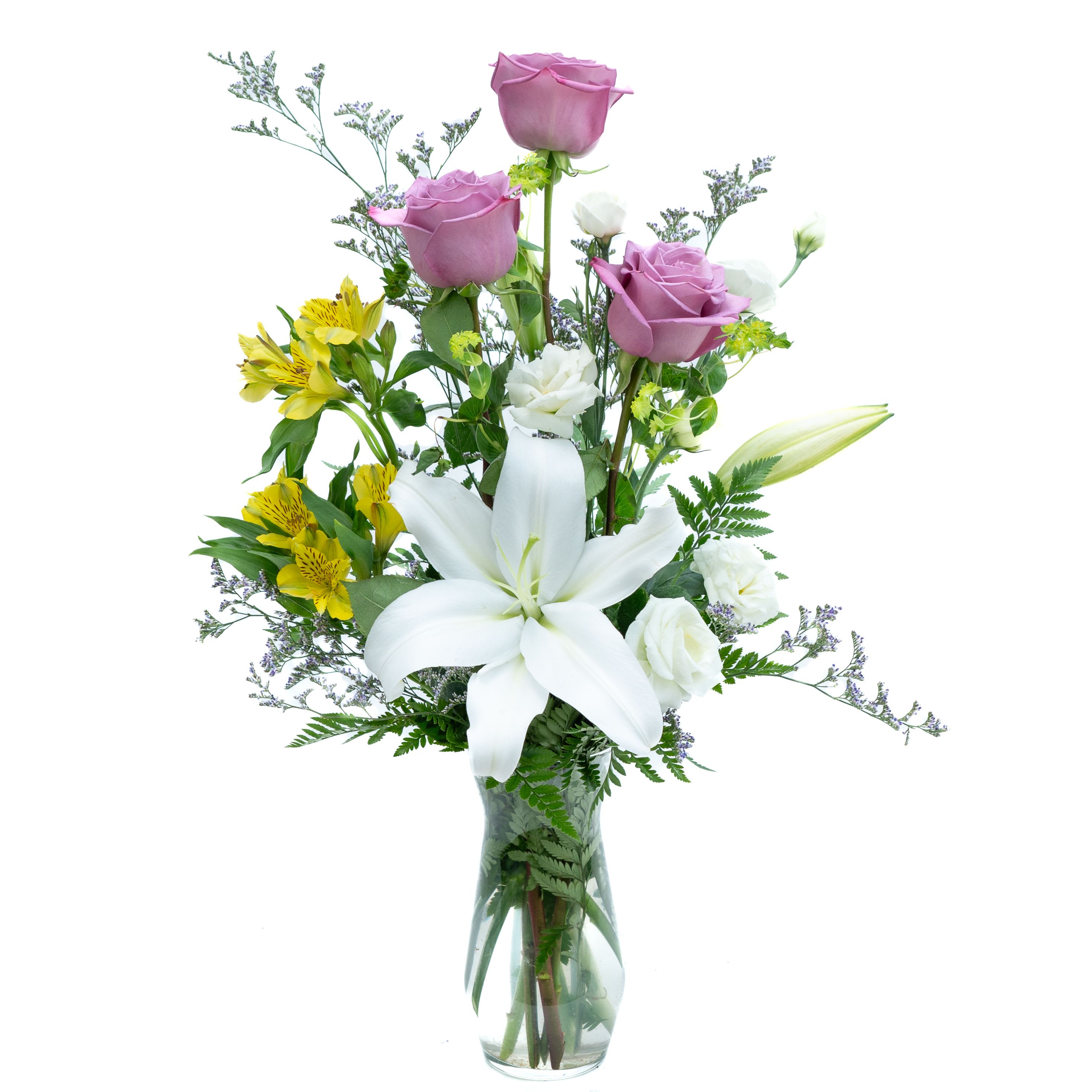 Serene Elegance Bouquet - Experience the timeless beauty of our Serene Elegance Bouquet, thoughtfully arranged in a one-sided design within a clear glass 8 1/2&quot; vase. This exquisite arrangement features a stunning white oriental lily, delicate lavender limonium, elegant white lisianthus, cheerful yellow alstroemeria, and graceful lavender roses. Perfect for expressing your sentiments on any occasion, this bouquet radiates sophistication and tranquility, bringing a touch of serene elegance to any space.