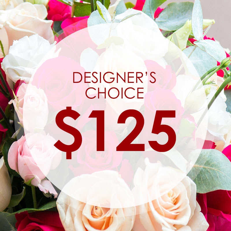 Designer's Choice $125.00 - Our designer's will create a beautiful arrangement using only the most beautiful premium flowers and  the freshest blooms of the season!  *Due to COVID-19 your arrangement will be designed and include shades of fresh vibrant flowers. Flowers and containers may not reflect exactly as pictured. While we cannot guarantee a specific flower type, we always ensure your arrangement is beautiful, fresh and one of a kind! 