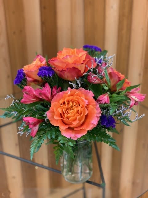 CHEERFUL DELIGHT - THIS BRIGHT COLORED ARRANGEMENT IS PERFECT FOR ANY OCCASION!