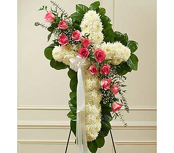 White Cross with Pink Rose Break White Cross with Pink Rose Break - This beautiful floral tribute shows your faith, hope and love during this difficult time. This standing spray arrangement – in the shape of a cross – is created from fresh white mums, pink roses, spiral eucalyptus and more. As Shown : HUD-91200