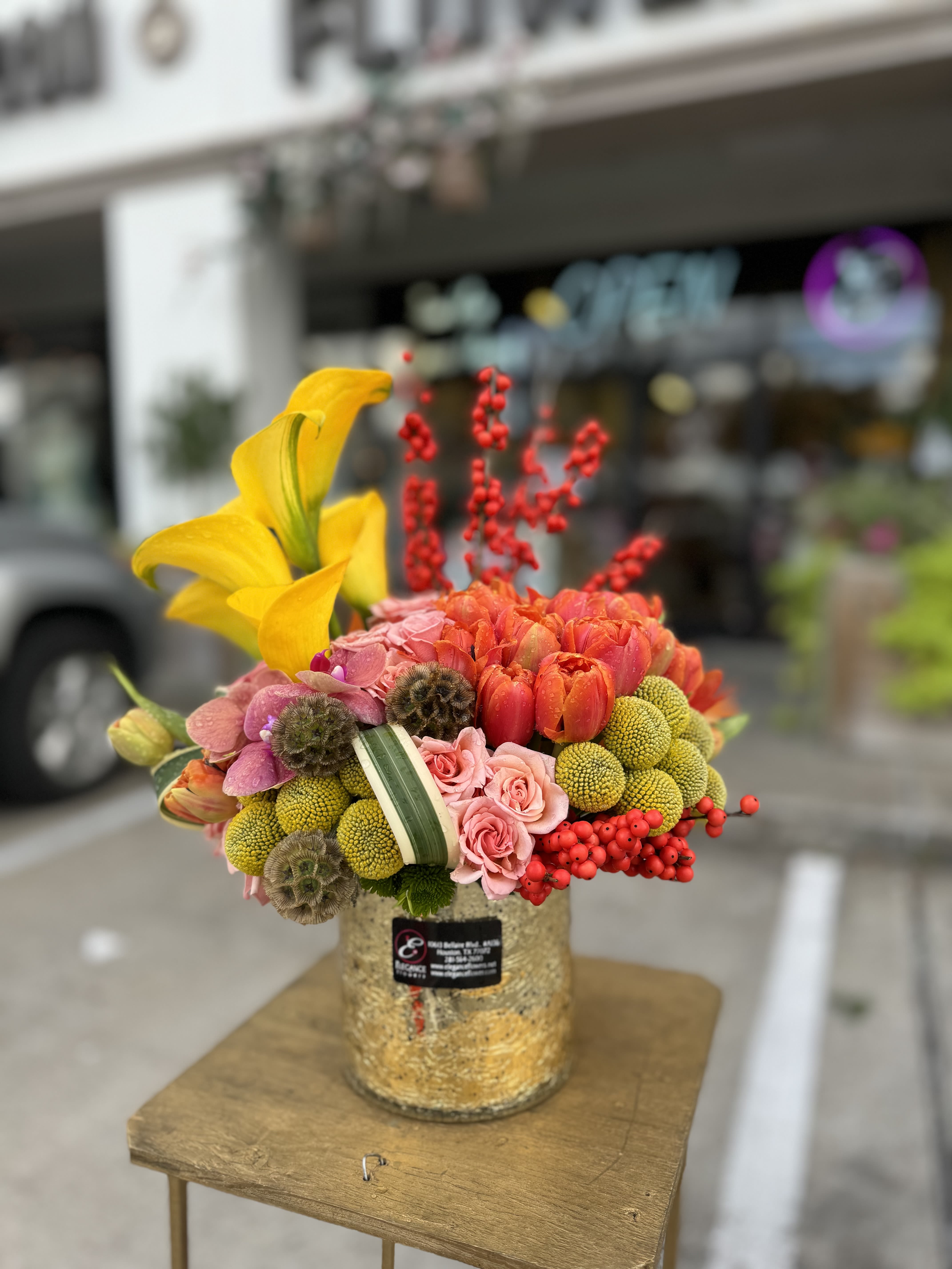 Autumn Grace Autumn Grace - Celebrate the warmth of Thanksgiving with this stunning arrangement of autumn blooms. Perfect for gracing your holiday table or gifting to loved ones, it brings a touch of gratitude and festive charm to the season.