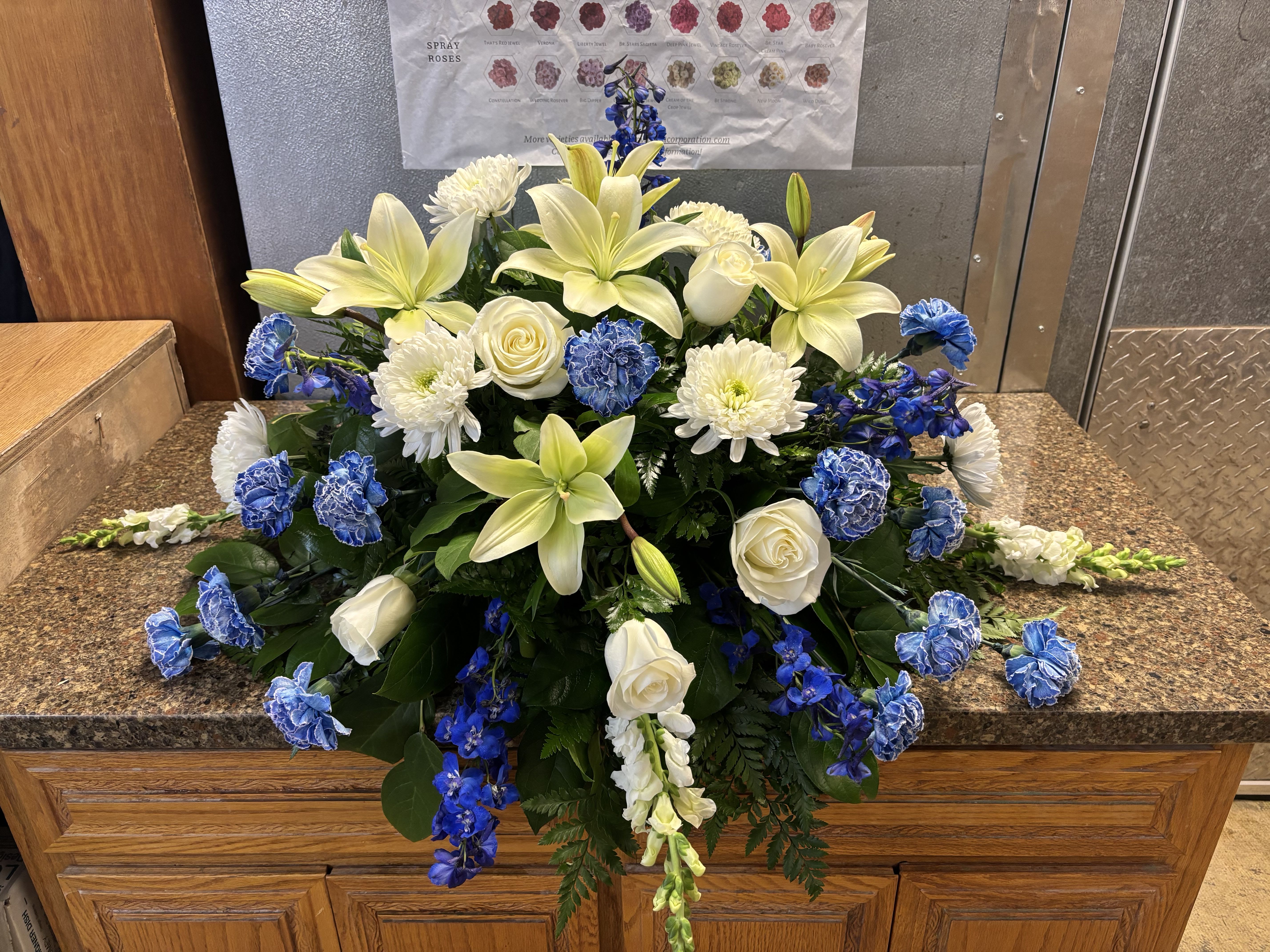 Blue & White Casket Blue & White Casket - Beautiful blue and white mix flower casket