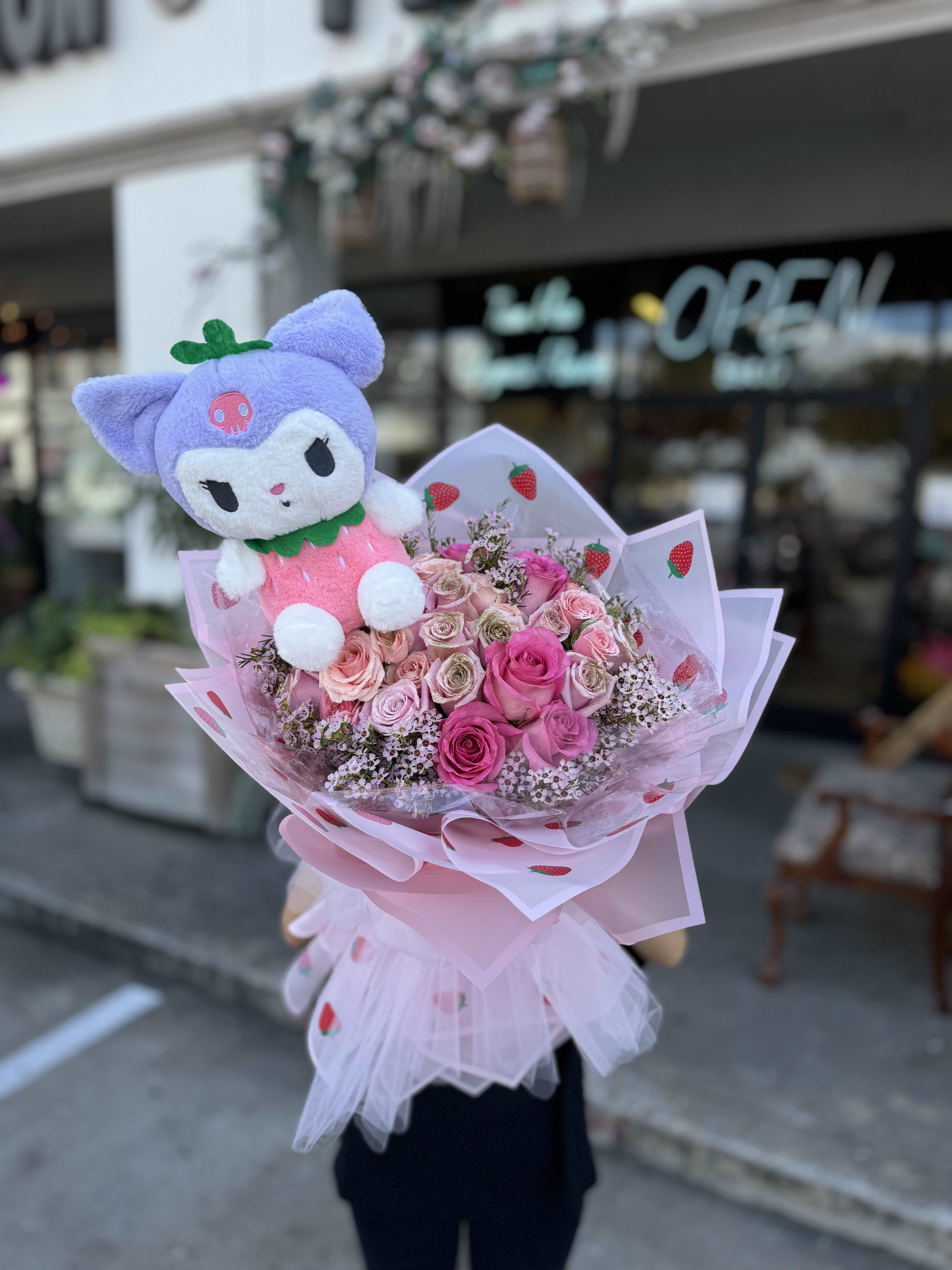 Sanrio Collection / Kuromi #3 Sanrio Collection / Kuromi #3 - A wrapped bouquet of flowers is a beautifully arranged collection of blooms, carefully selected and elegantly wrapped in decorative paper or fabric. These bouquets often feature a mix of fresh, vibrant flowers, and complemented by lush greenery. Wrapped bouquets are perfect for any occasion, from expressing love and gratitude to celebrating special moments, offering a thoughtful and visually stunning gift