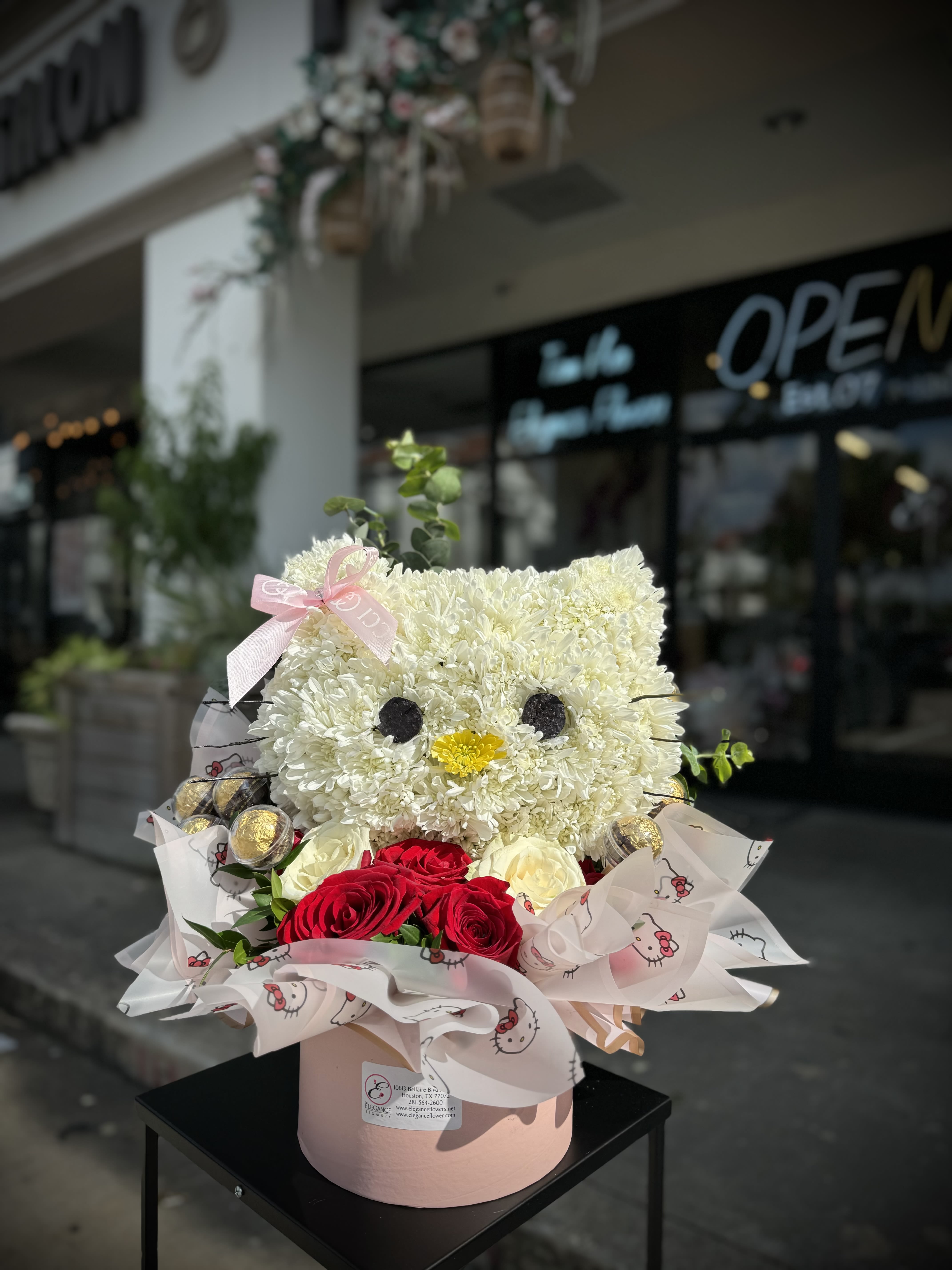 Sanrio Collection / Hello Kitty #2 - A charming Hello Kitty-themed arrangement featuring a delightful mix of fresh blooms in soft pinks, whites, and pastels, accented with adorable Hello Kitty elements for a touch of sweetness. Perfect for birthdays, special occasions, or simply to brighten someone’s day!