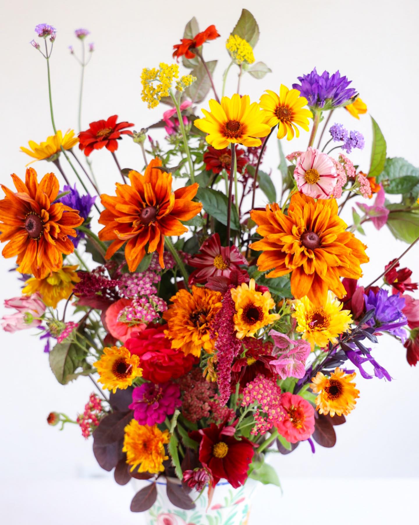 The Garden Party Arrangement - The Garden Party! 100% Leafsong Family Farm grown. A wonderful hostess gift and everyday sunny farm flower art. Make your day smile with our artisan floral farm grown joy!     Arrangements will be delivered before 7pm, for specific delivery time please include in special instructions. On holidays, our busiest times, deliveries will be made by 7:30pm.