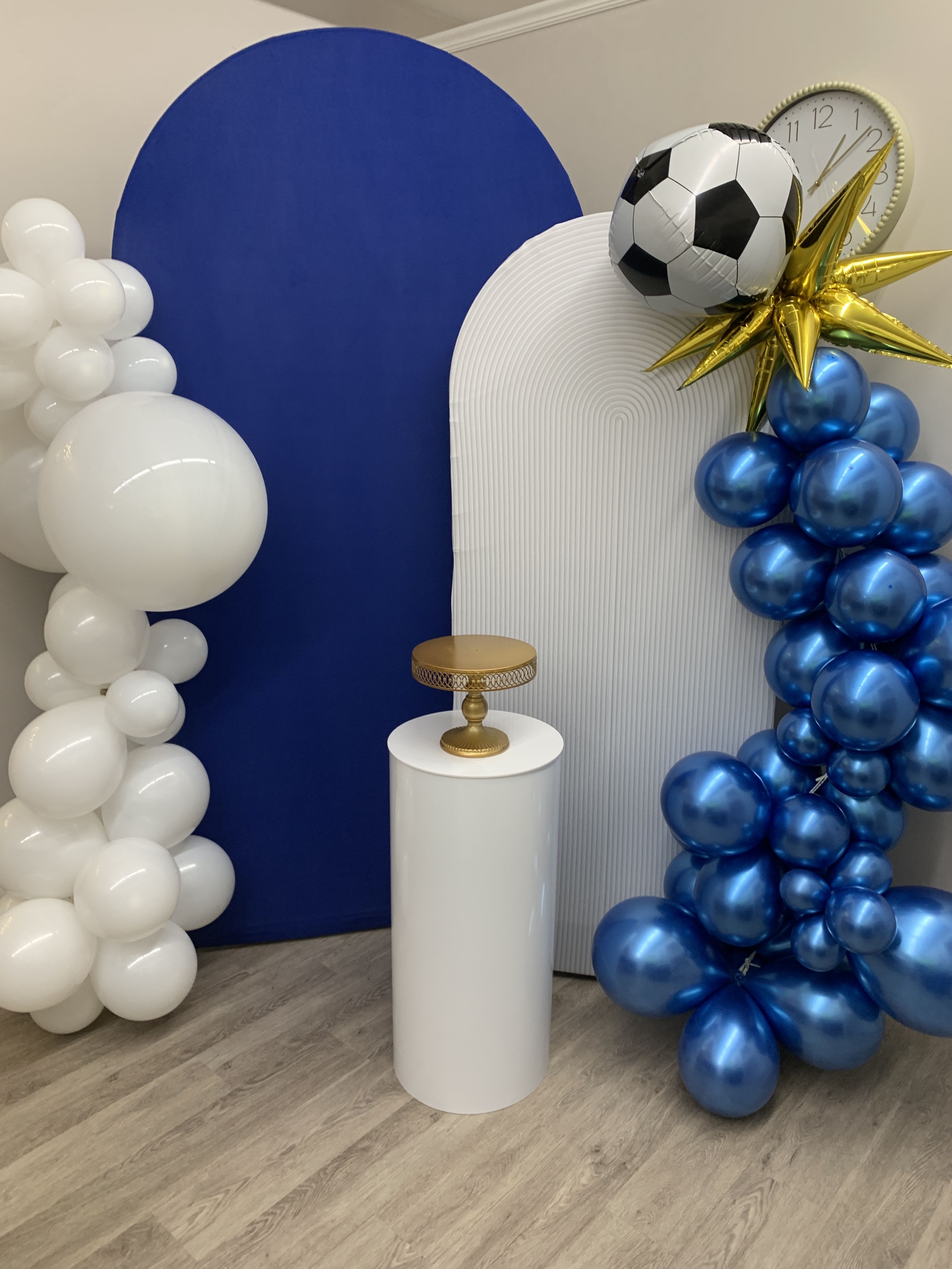 Double Arch Rental Double Arch Rental - Double arch rental with your choice of color combo. Includes cake pedestal and two balloon garlands on each side. Custom Vinyl Letters are available at $75 additional.