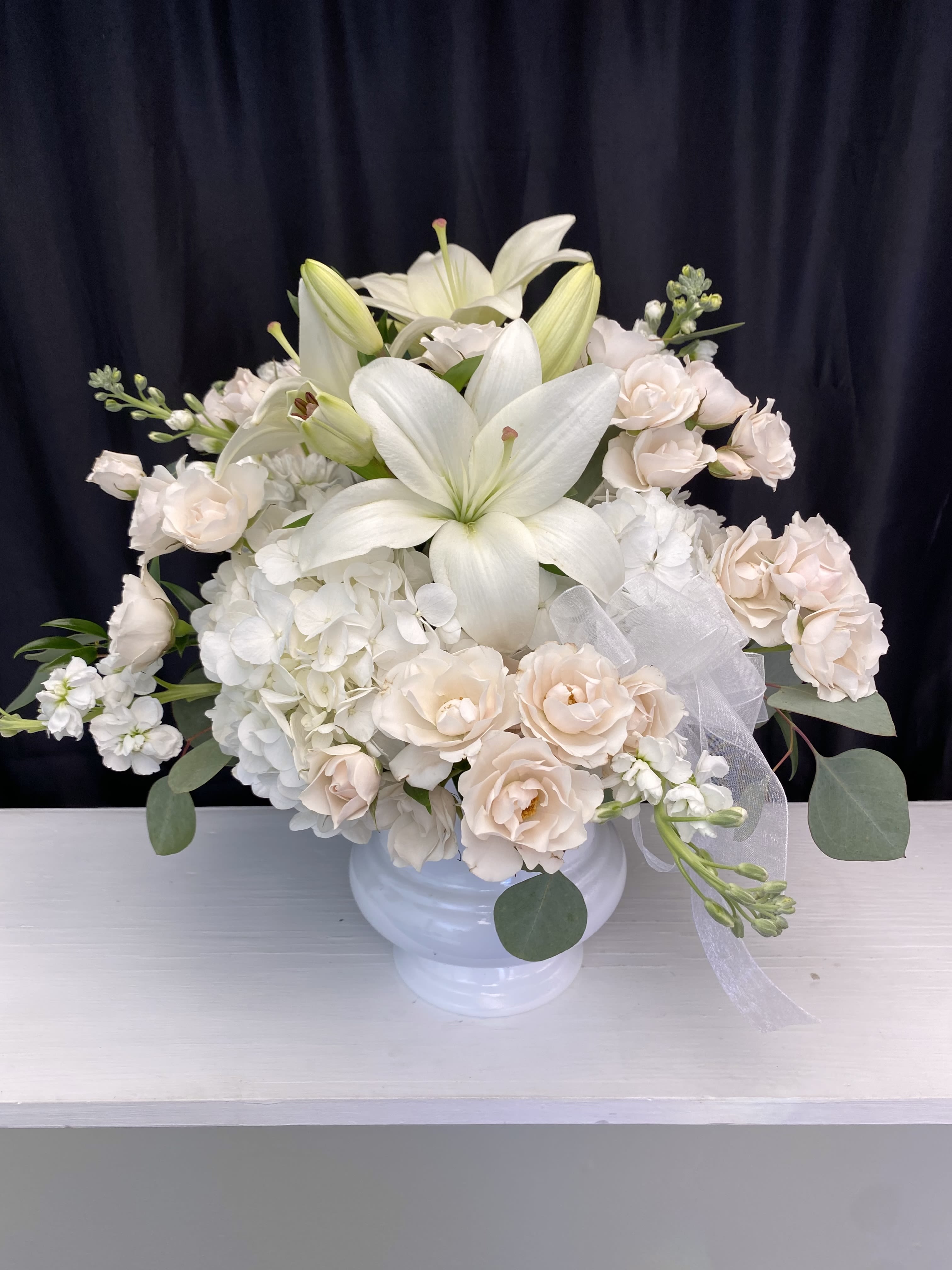 Angel Kiss - White and blush pink tones speak softly in this soft arrangement 