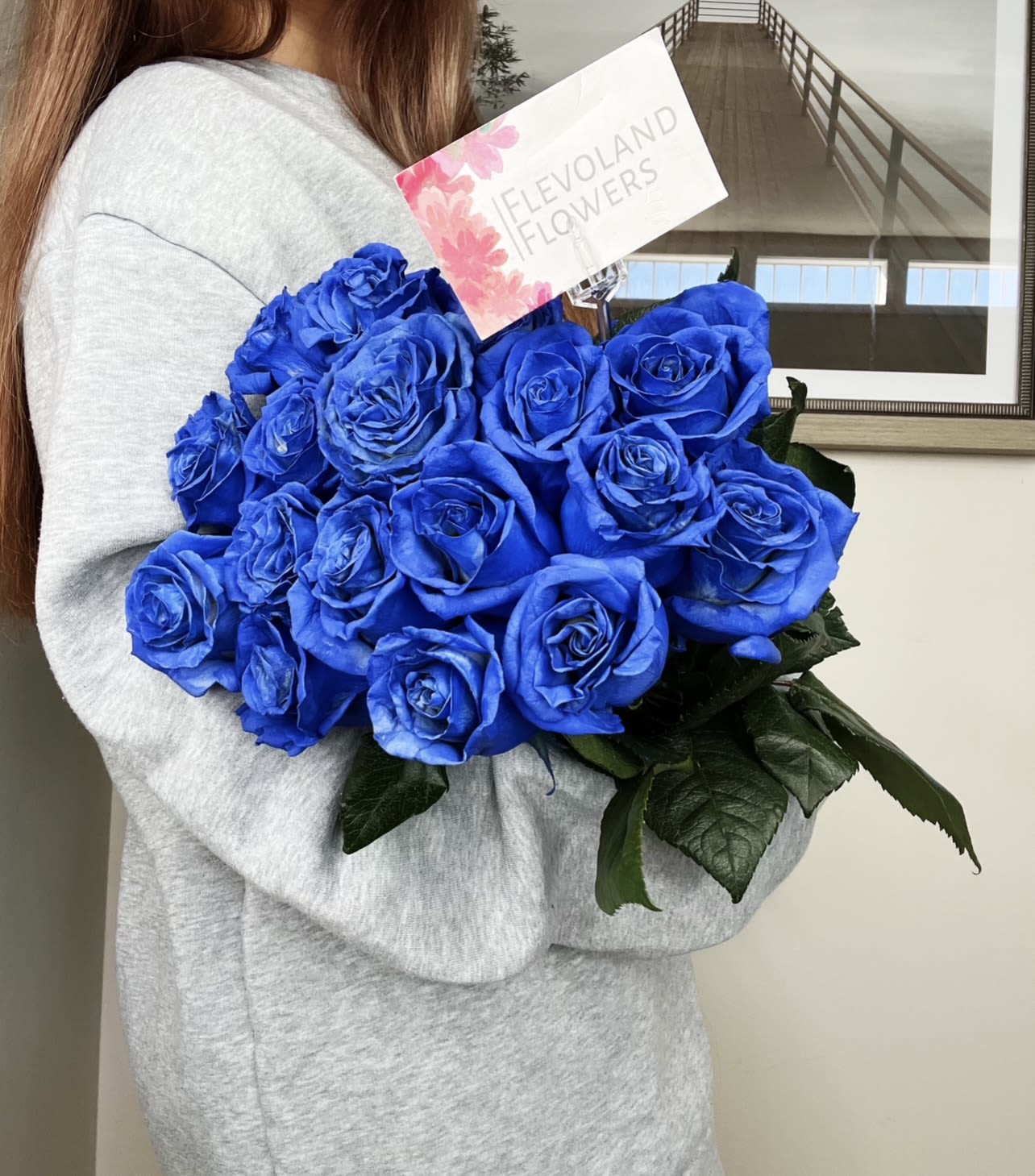 Blue Roses -  A stunning arrangement of 24 blue roses, perfect for those seeking a unique and sophisticated gift. Their deep color and elegance make them the ideal choice for any special occasion.