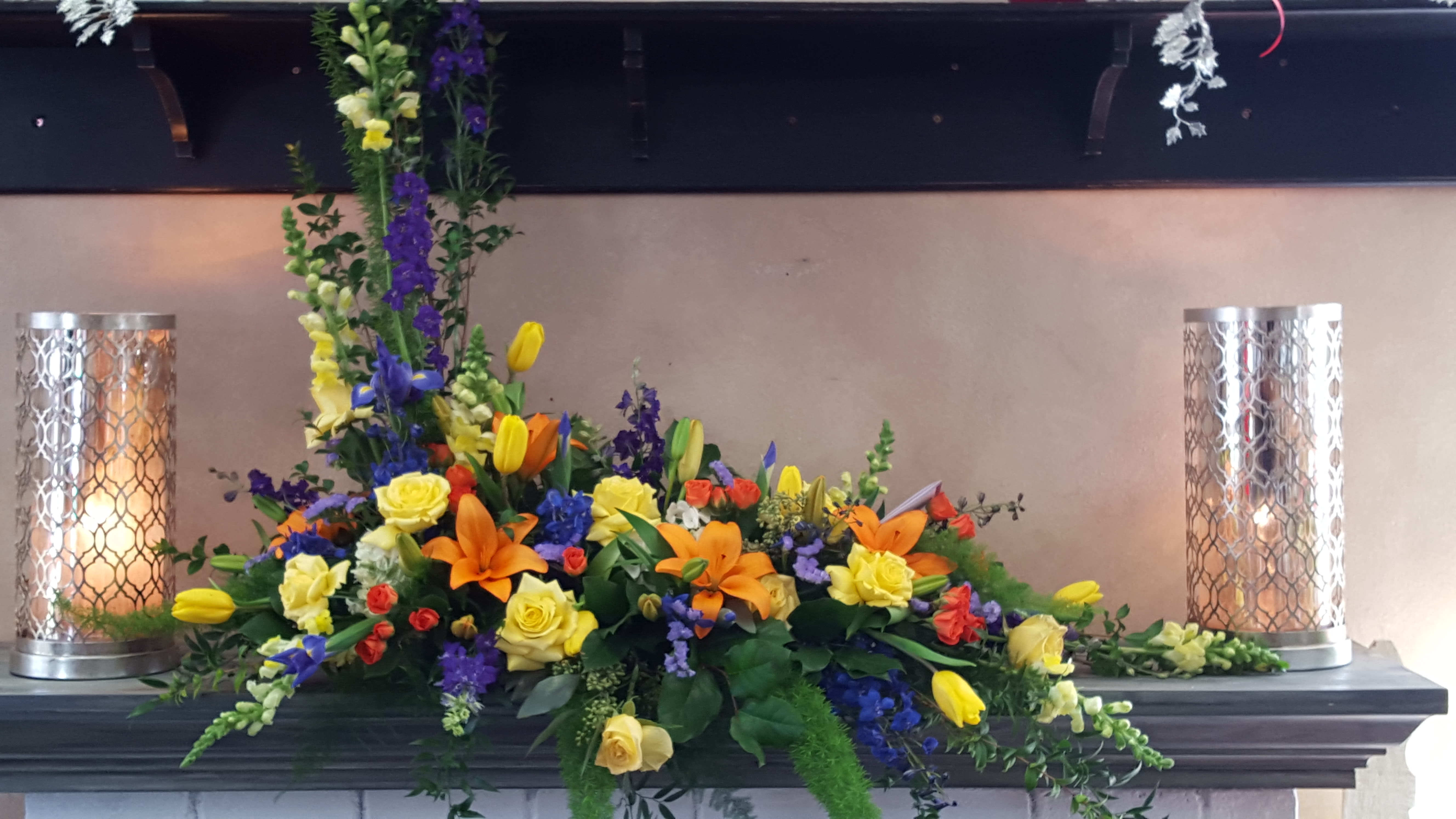 Colorful L-Shaped Memorial *****allow 2 days to gather product******* - This L-Shaped floral arrangement is made with bright colors from the freshest flowers available.  PLEASE NOTE, Flowers can be different based on what looks best at time of order.  If there is a particular flower or color then please not that in the special instructions.  