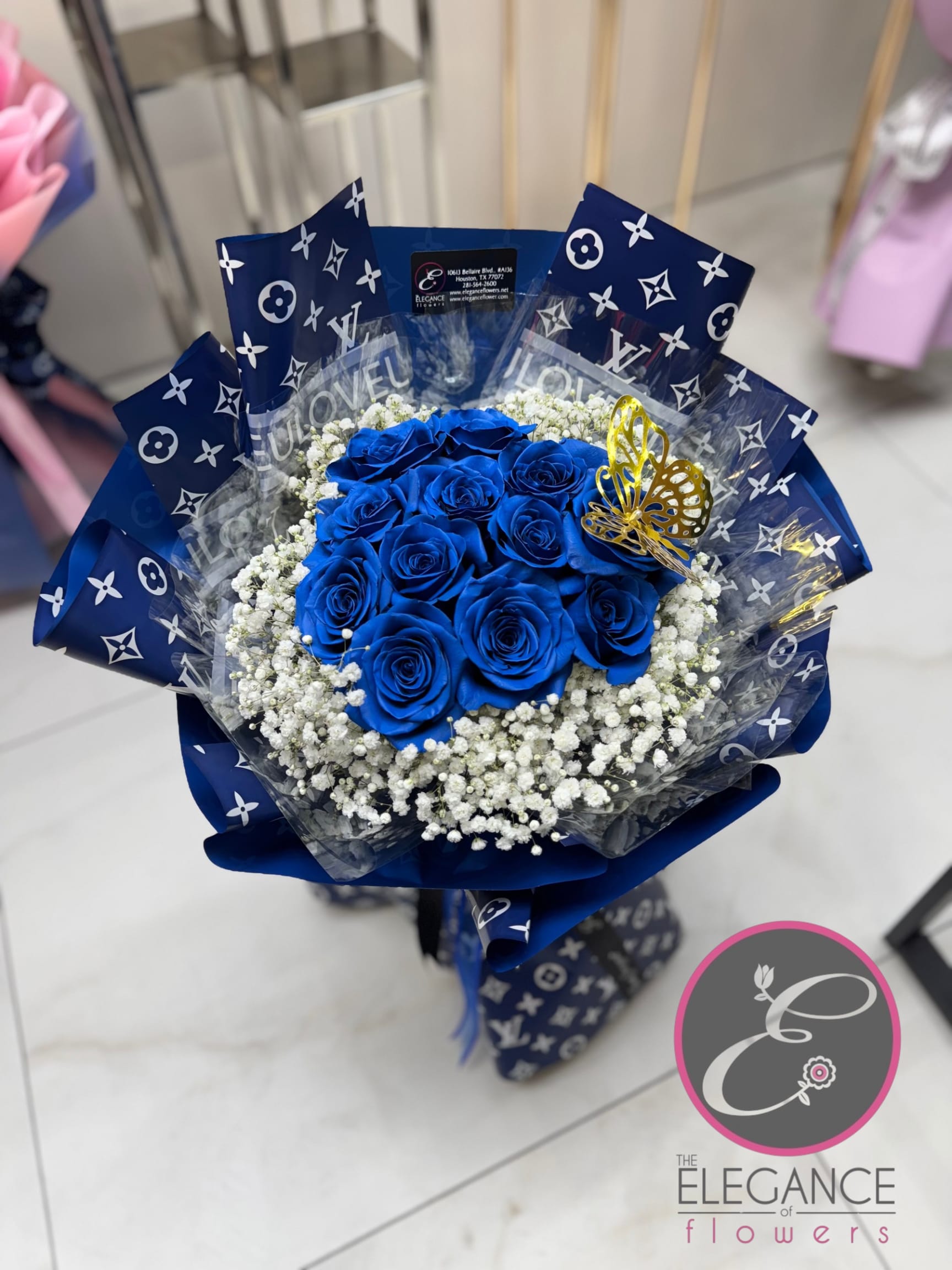 Wrapped Bouquet #5 Wrapped Bouquet #5 - A wrapped bouquet of flowers is a beautifully arranged collection of blooms, carefully selected and elegantly wrapped in decorative paper or fabric. These bouquets often feature a mix of fresh, vibrant flowers, and complemented by lush greenery. Wrapped bouquets are perfect for any occasion, from expressing love and gratitude to celebrating special moments, offering a thoughtful and visually stunning gift.