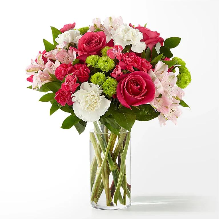 Sweet &amp; Pretty Bouquet - The true beauty of this bouquet is within the sweet colors of the flowers. An array of hot pink roses, pale pink alstroemeria and more are set in a glass cylinder vase, making a wonderful gift to light up the face of its recipient