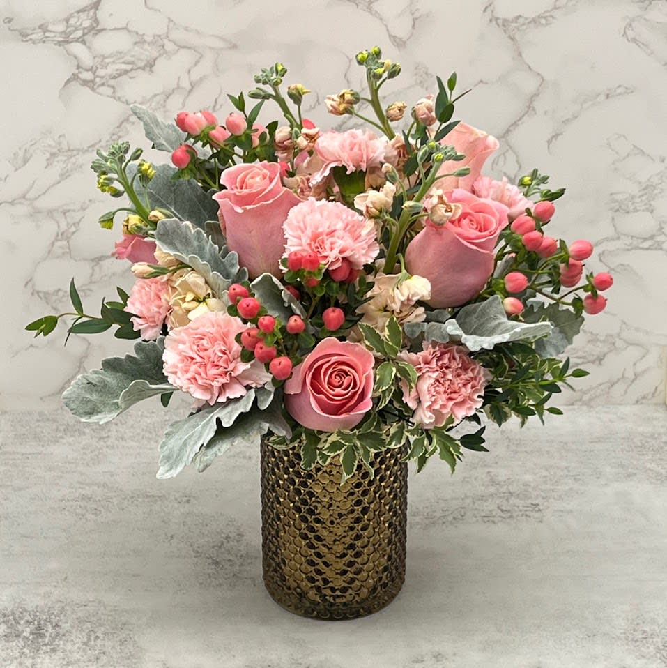 Delicate Blooms -  an elegant crystal gold vase with show-stopping pink roses, pink carnations, peach stock flowers, baby pink hypericum and eucalyptus for some extra volume 