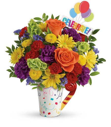 Celebrate You Bouquet - It's a party to go! Celebrate life's special moments with this fun, fabulous mix of roses, carnations and mums, hand-delivered in a festive, food-safe mug that will make their coffee breaks extra fun. Perfect for any festive occasion, from birthday parties to graduations to retirements!  This delightful gift bursts with orange roses, purple carnations, red miniature carnations, yellow button spray chrysanthemums, yellow daisy spray chrysanthemums, bells of Ireland, blue sinuata statice, and huckleberry. Delivered in a Cheers to You mug. Approximately 13 1/4&quot; W x 15 1/4&quot; H