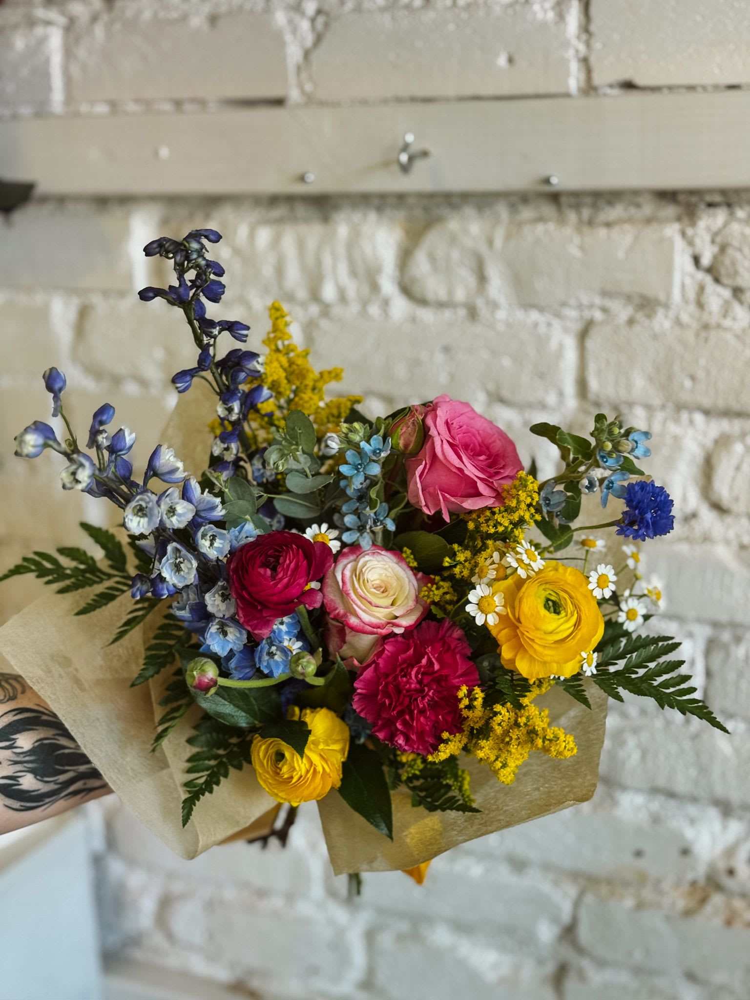 Pan Pride - Celebrate love in all its vibrant forms with the Pan Pride bouquet — a bold and joyful arrangement inspired by the colors of the pansexual pride flag. Featuring a striking mix of hot pinks, sunny yellows, and bright blues, this bouquet is a radiant tribute to inclusivity, identity, and pride. Designed to spark joy and stand tall as a symbol of visibility, Pan Power makes the perfect gift or statement piece for Pride Month. 