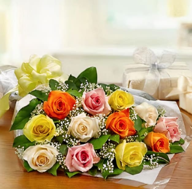 Dozen Mixed Roses Wrapped - One dozen mixed colors of our freshest roses wrapped in a bouquet!