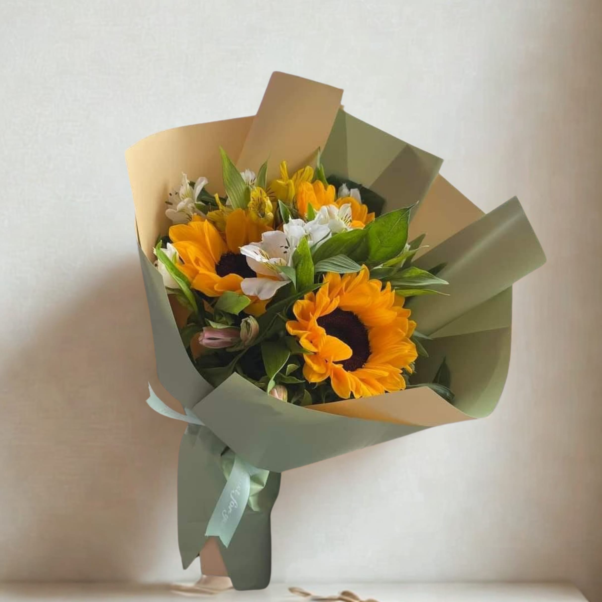Bouquet of Sunflowers - A bouquet of sunflowers and other pretty flowers, beautifully wrapped.