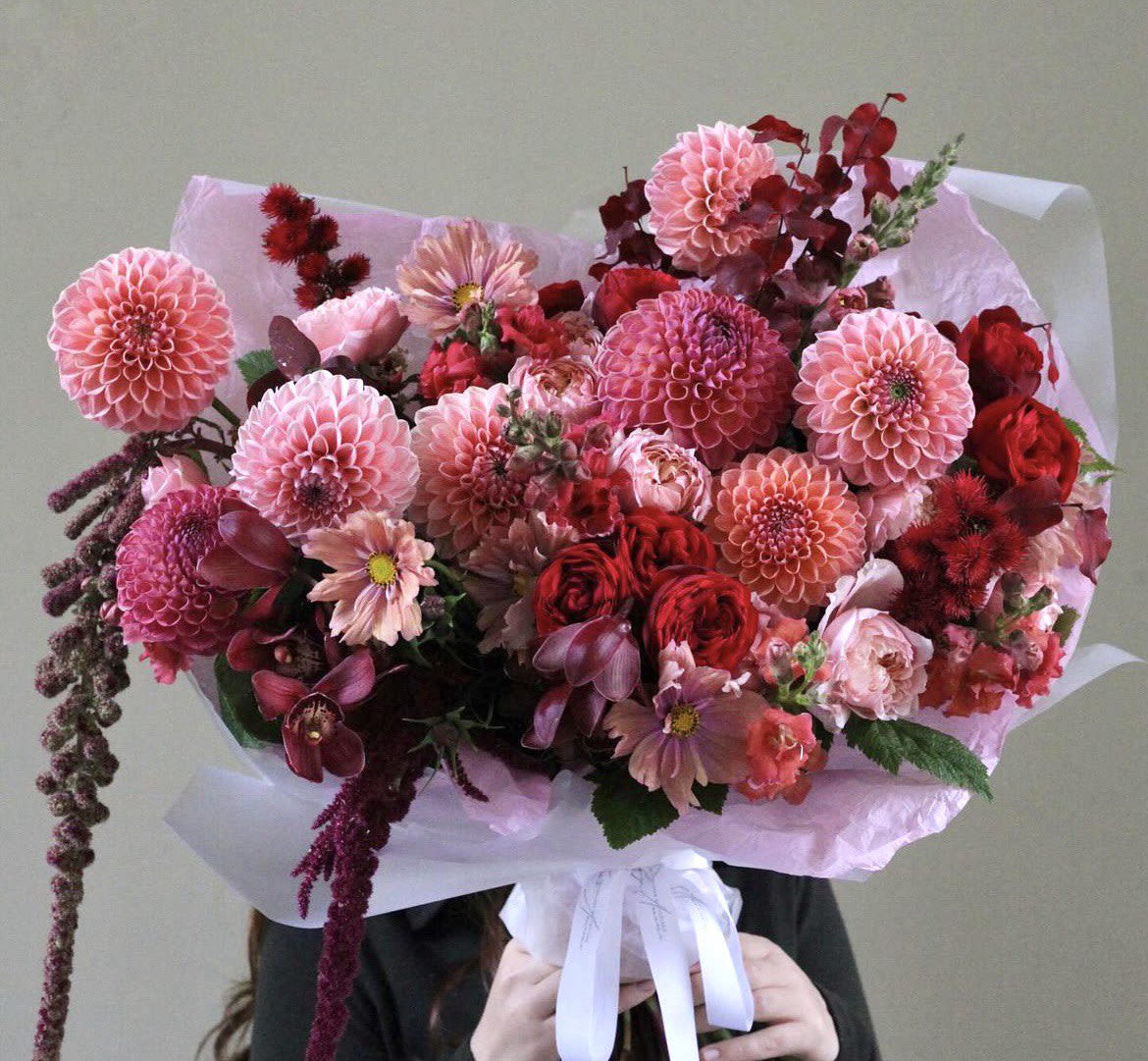 Harmony Harmony - Featuring dahlias in a range of shades, from rich, deep reds to soft pinks, this bouquet showcases the natural beauty and intricate detail of dahlias, making it a great choice for gifting.