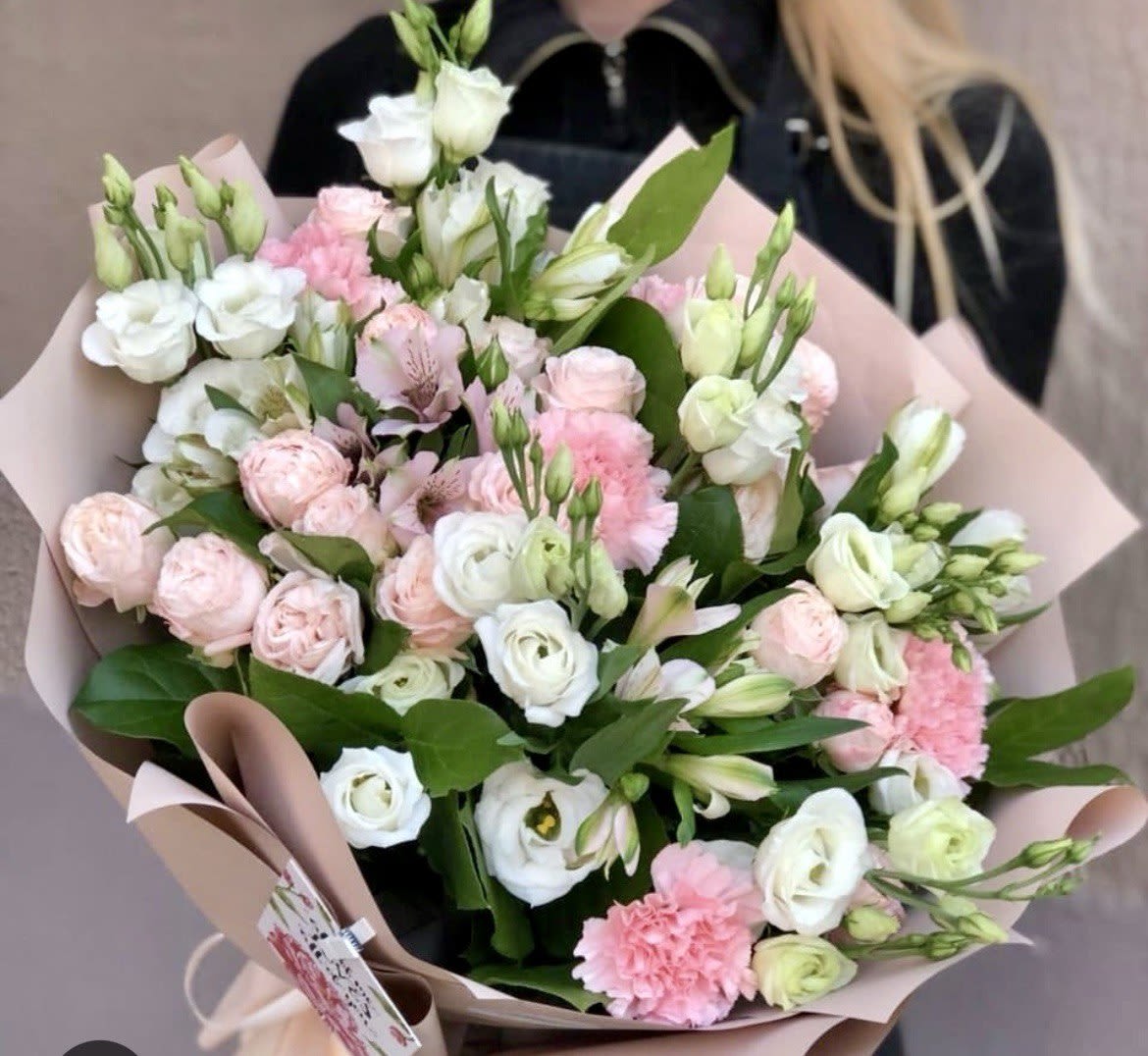 Blush of Elegance Blush of Elegance - The delicate mix of pink and white flowers gives it a sophisticated and charming look, perfect for any special occasion.