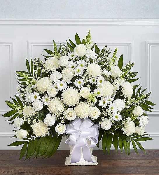 Heartfelt Tribute™ White Floor Basket Arrangement - All-white floor basket arrangement of roses, football mums, snapdragons, carnations, daisy poms and monte casino; accented with soft, lush greenery