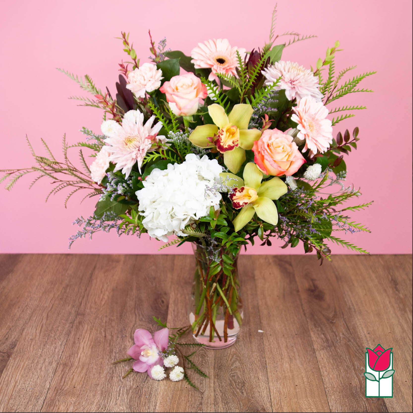 Beretania's Harmony Bouquet (Seasonal Varieties Vary) - Approx. size: 14&quot; High x 10&quot; Wide Size category: Medium Size, perfect for a desk  For this special time of the year, nothing but the best will do. Here at Beretania Florist we specialize in beautiful premium flowers and unbeatable freshness. This bouquet is full of fresh garden spring flower with a combination of our staff's favorites. This bouquet comes in a clear glass vase and includes a custom card message, provided by you!   