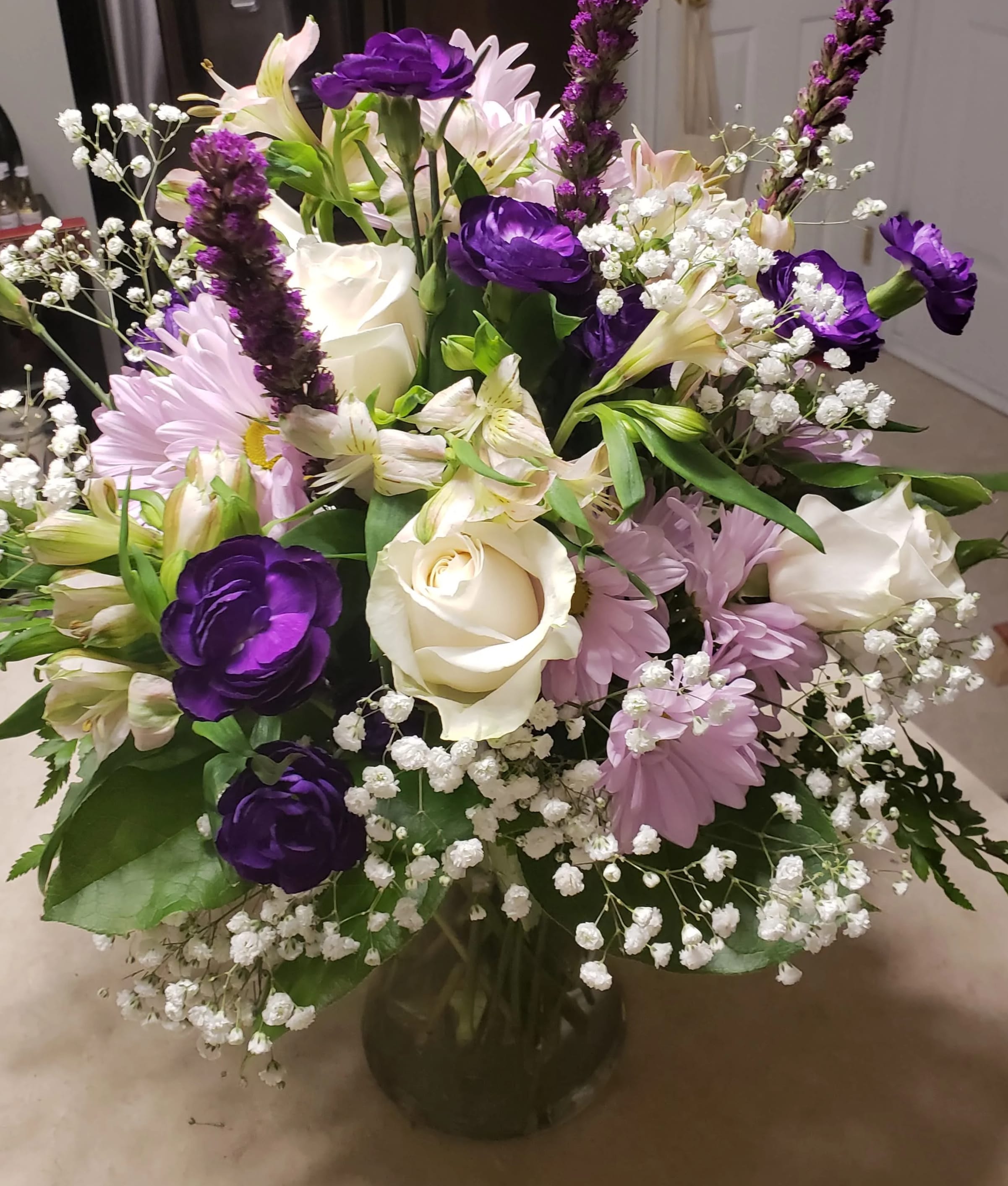 Small Designer's Choice vase Small Designer's Choice vase - Florist chosen flowers, images are for example only. Great for any Occasion-Small arrangement of seasonal blossoms sturdy blooms that last well and don't brake the bank. Leave us a note of the recipients favorite color and we will do our best to accommodate the request.